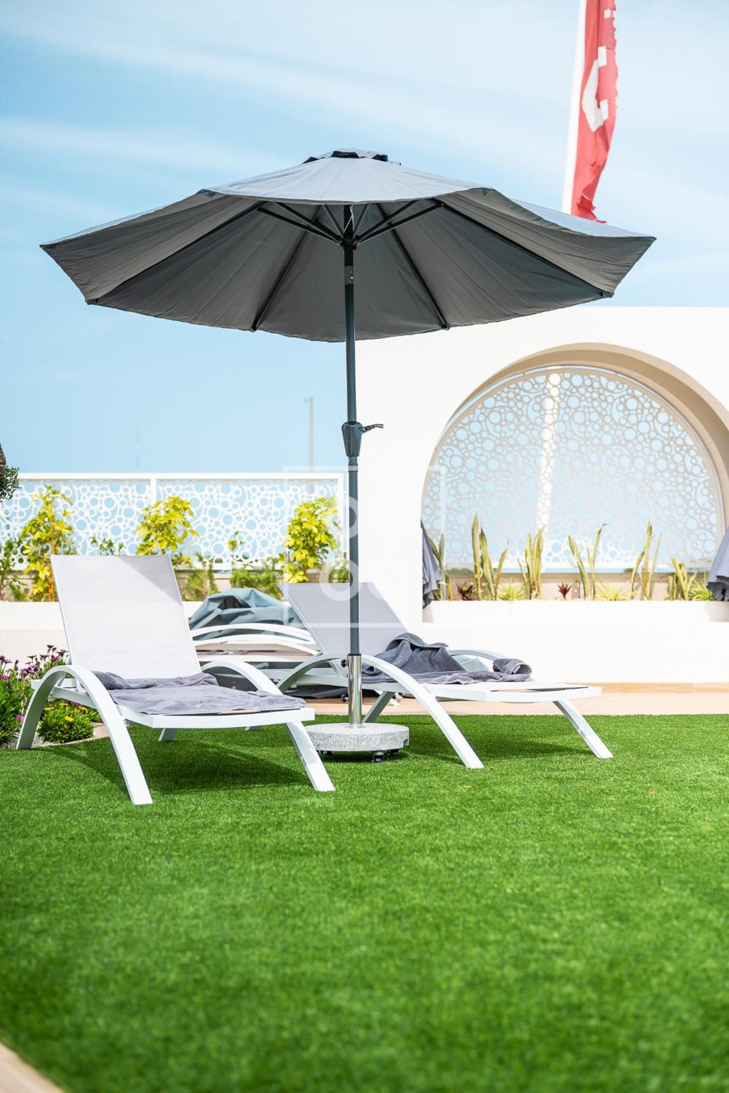 The Q Penthouse, apt with boho-chic rooftop, by OYOOSTAYS