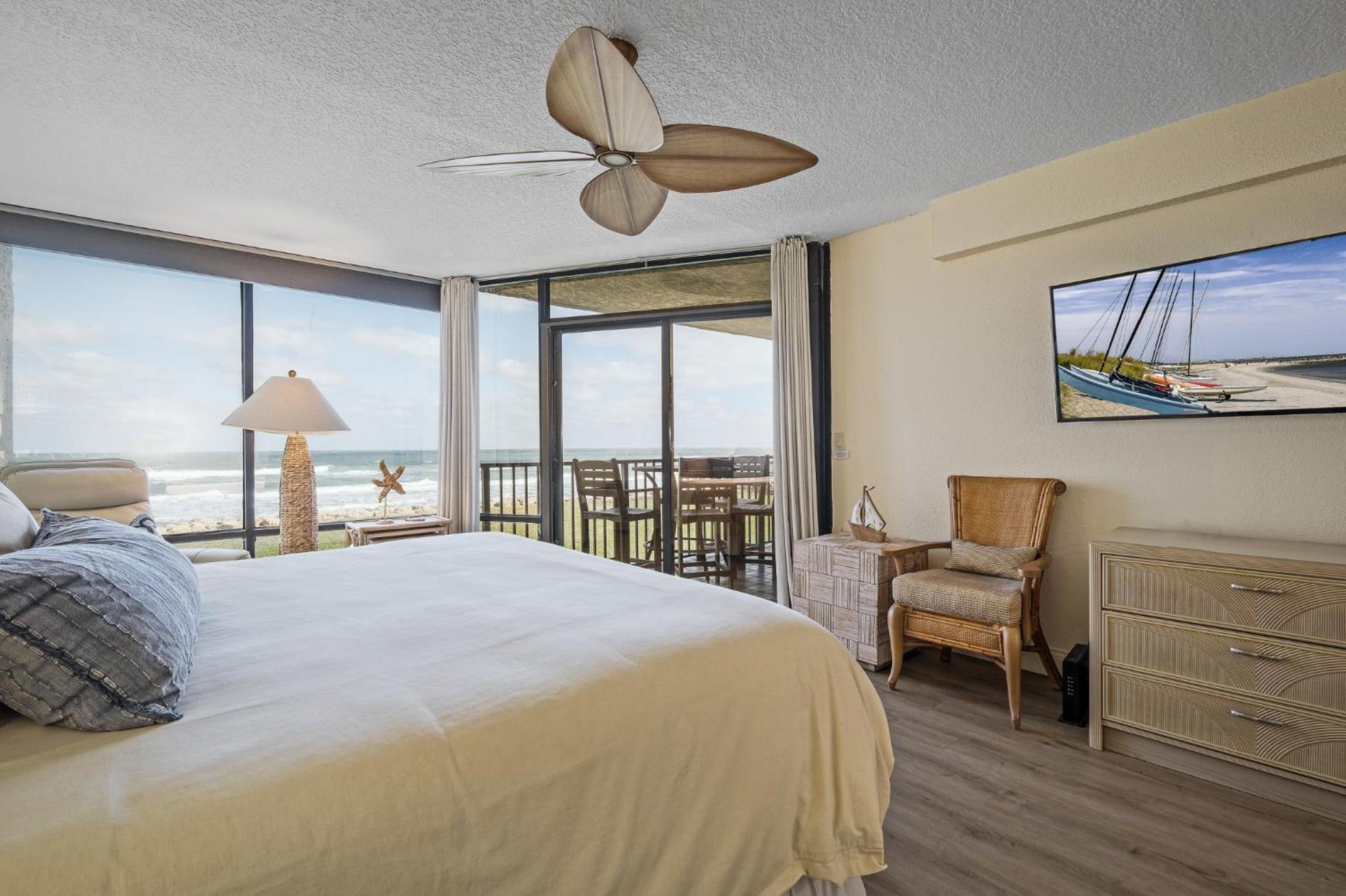 Updated direct oceanfront condo with large private balcony and a beachfront pool