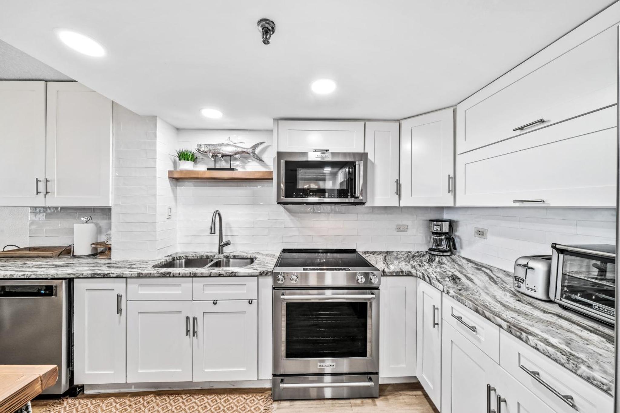 Updated direct oceanfront condo with large private balcony and a beachfront pool
