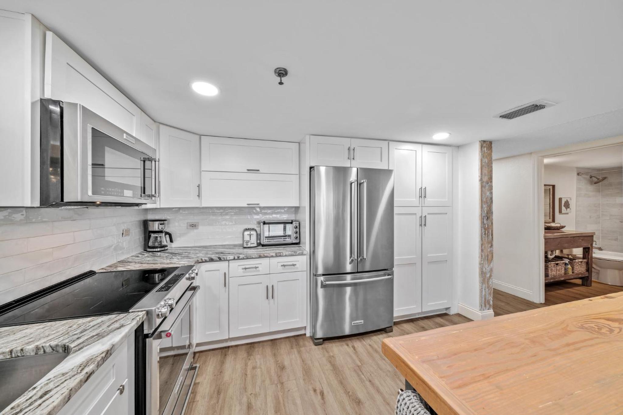 Updated direct oceanfront condo with large private balcony and a beachfront pool