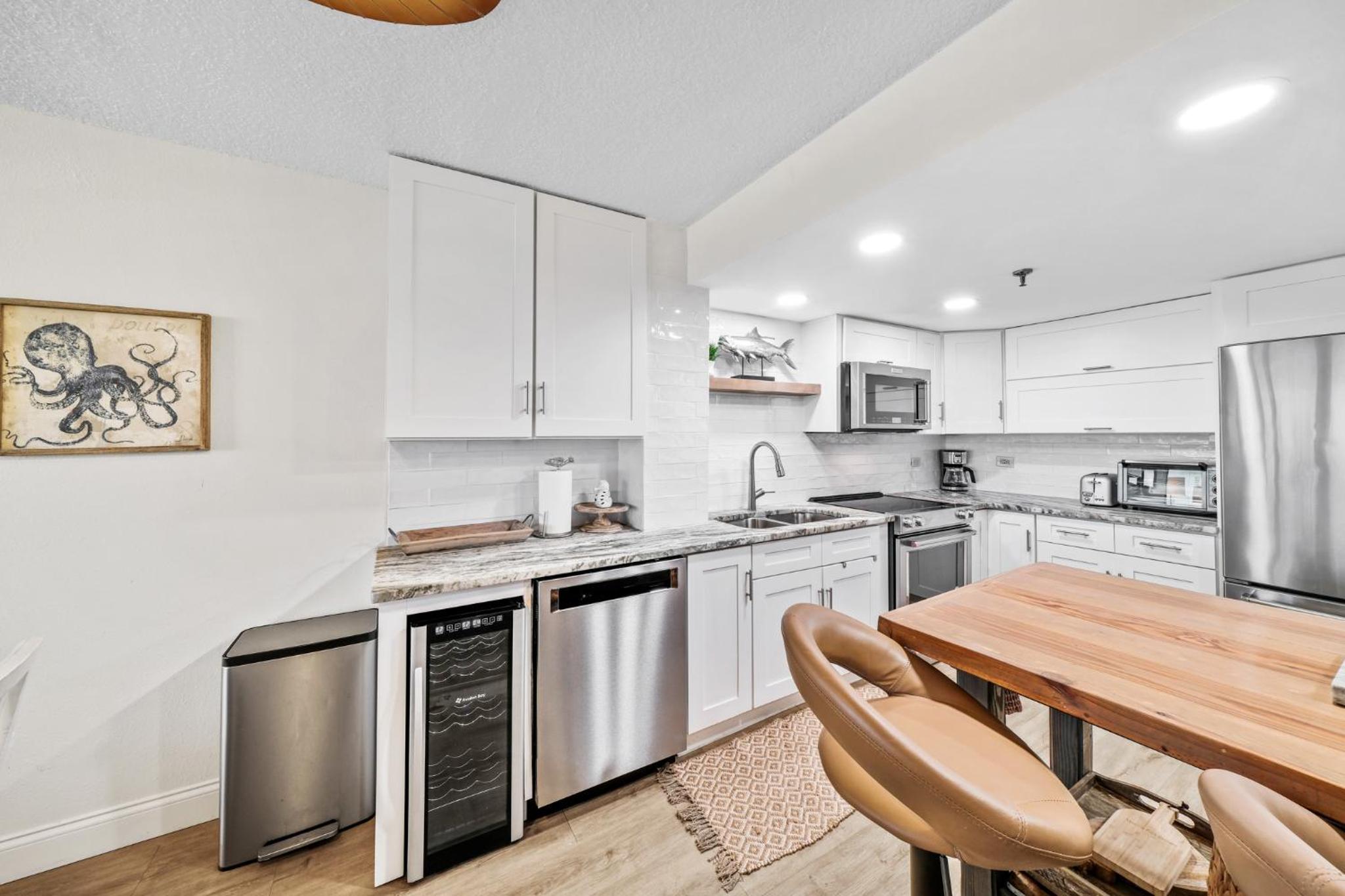 Updated direct oceanfront condo with large private balcony and a beachfront pool