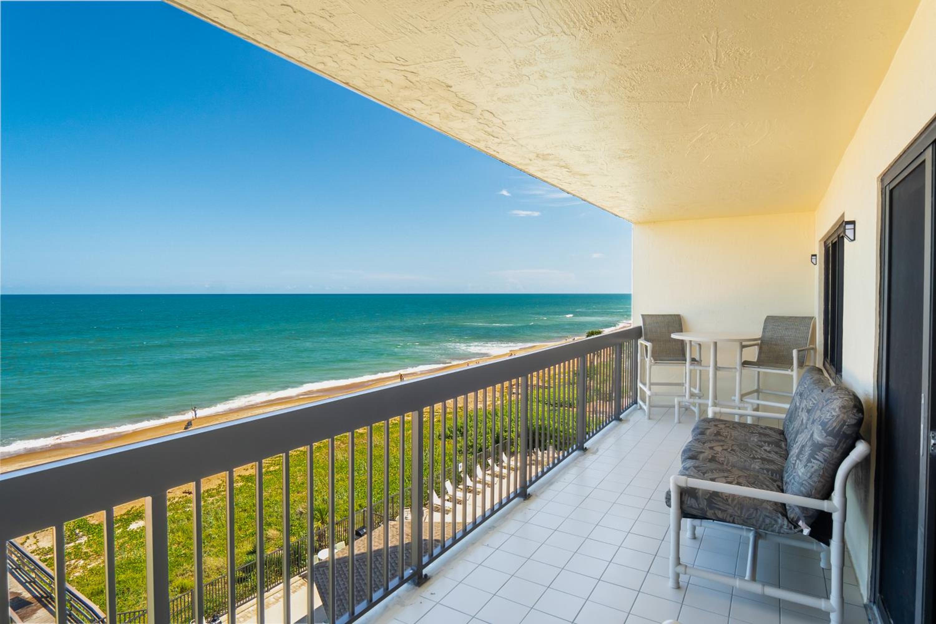 Luxury direct oceanfront corner with a large private balcony, heated pool and garage
