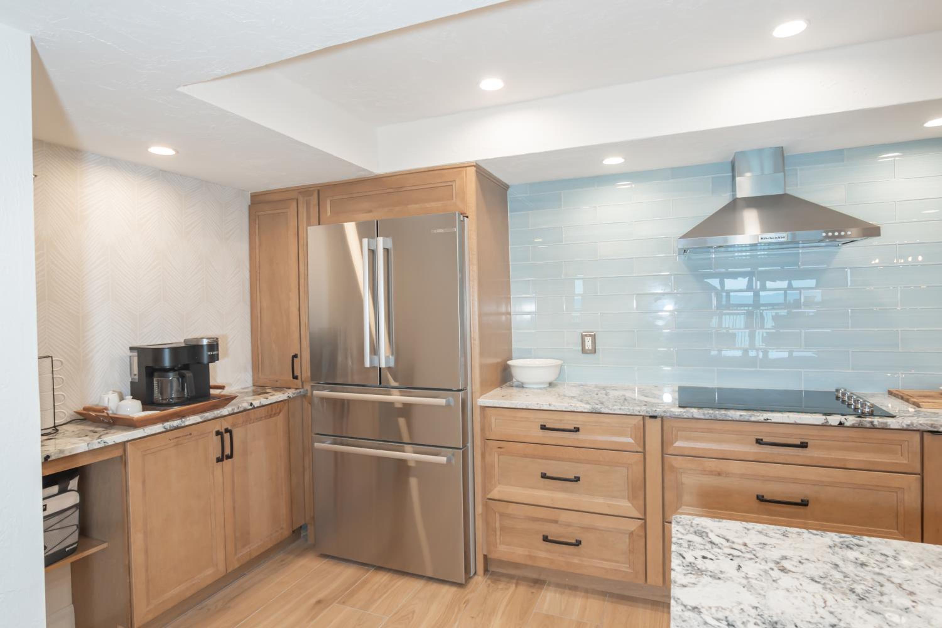 Luxury direct oceanfront corner with a large private balcony, heated pool and garage