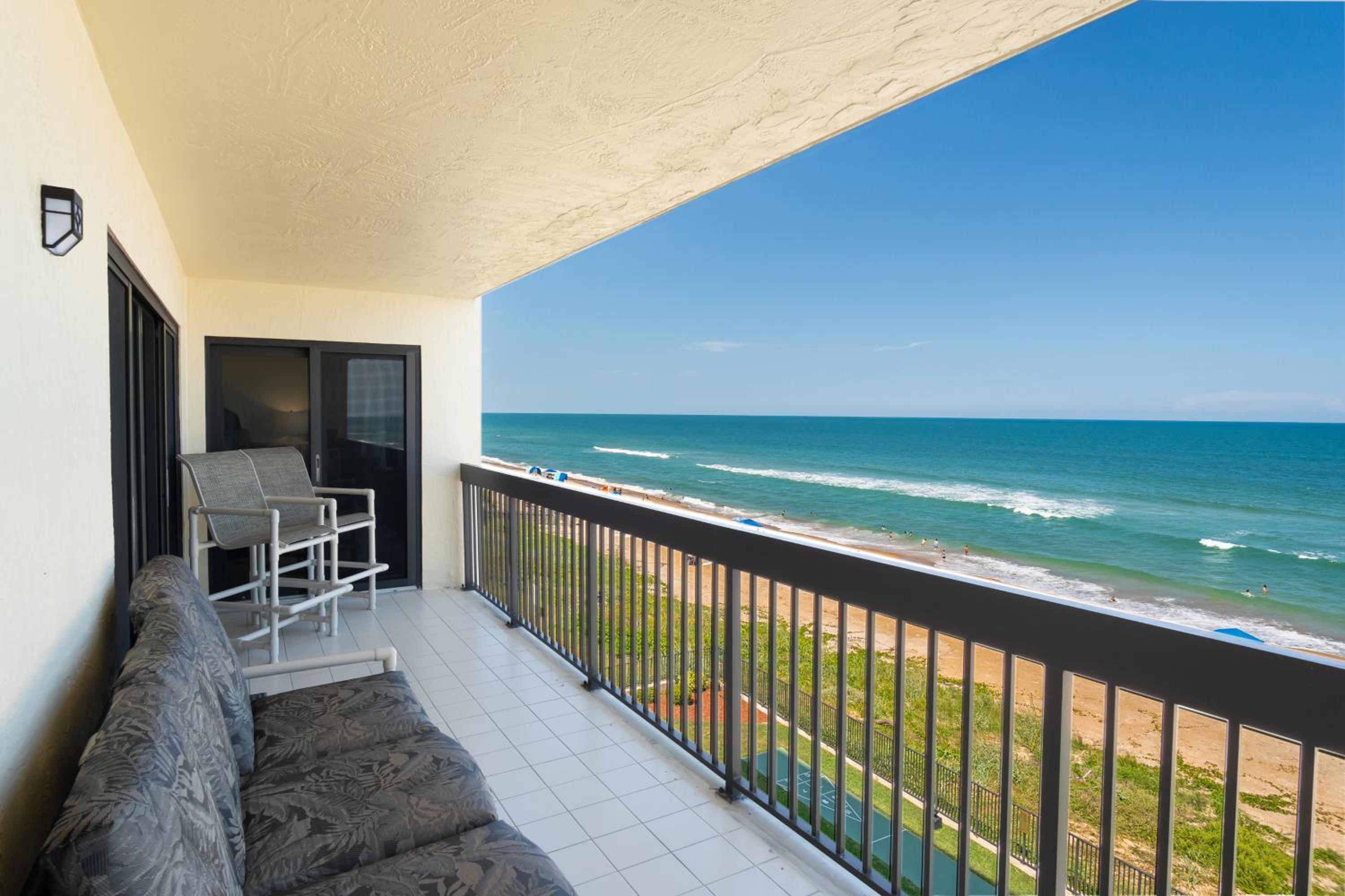 Luxury direct oceanfront corner with a large private balcony, heated pool and garage