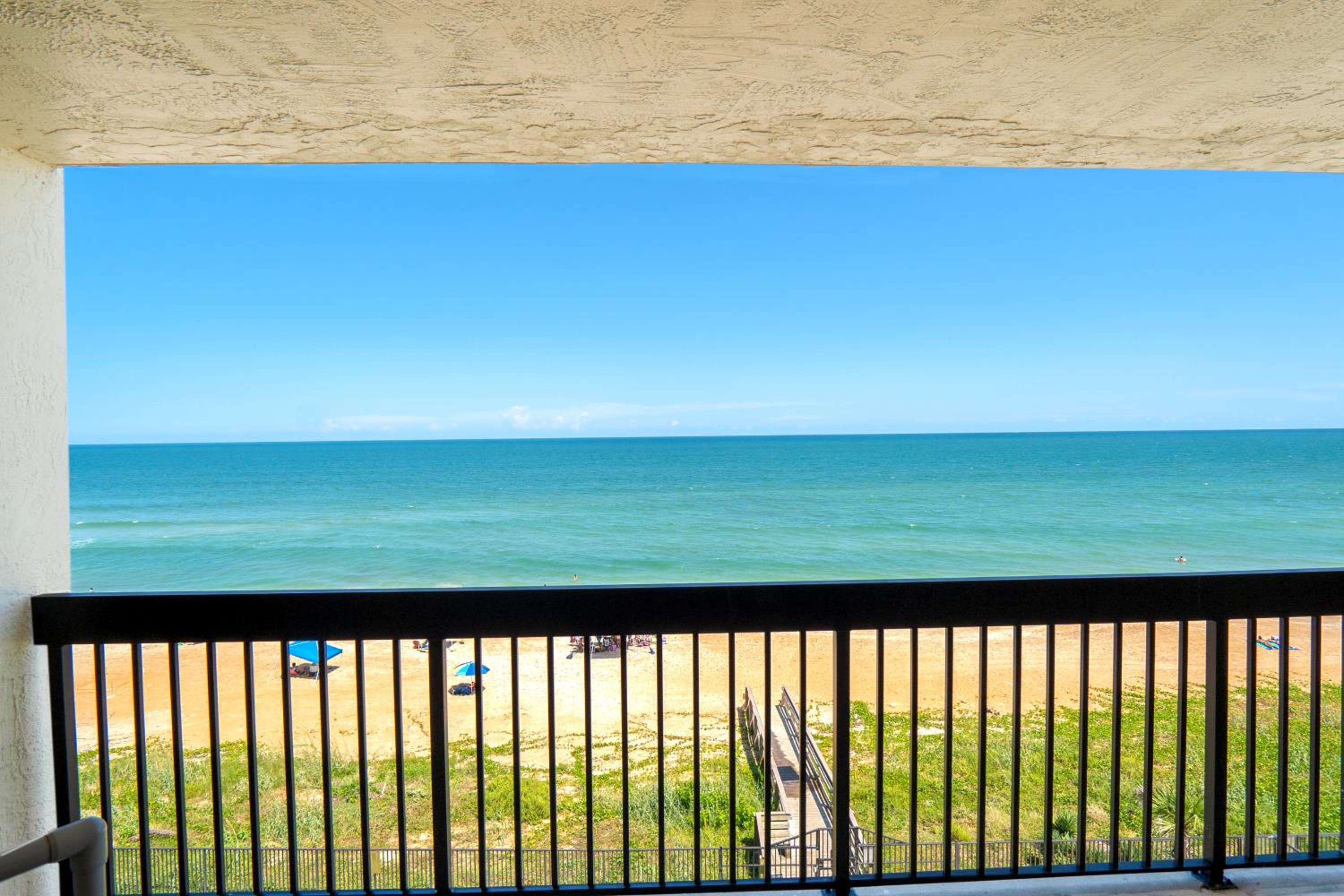 Luxury direct oceanfront corner with a large private balcony, heated pool and garage