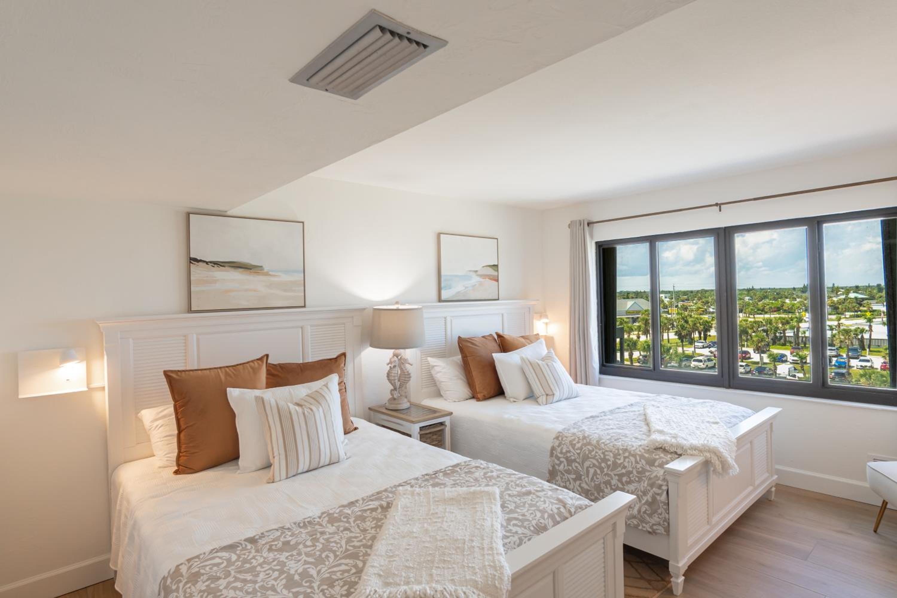 Luxury direct oceanfront corner with a large private balcony, heated pool and garage