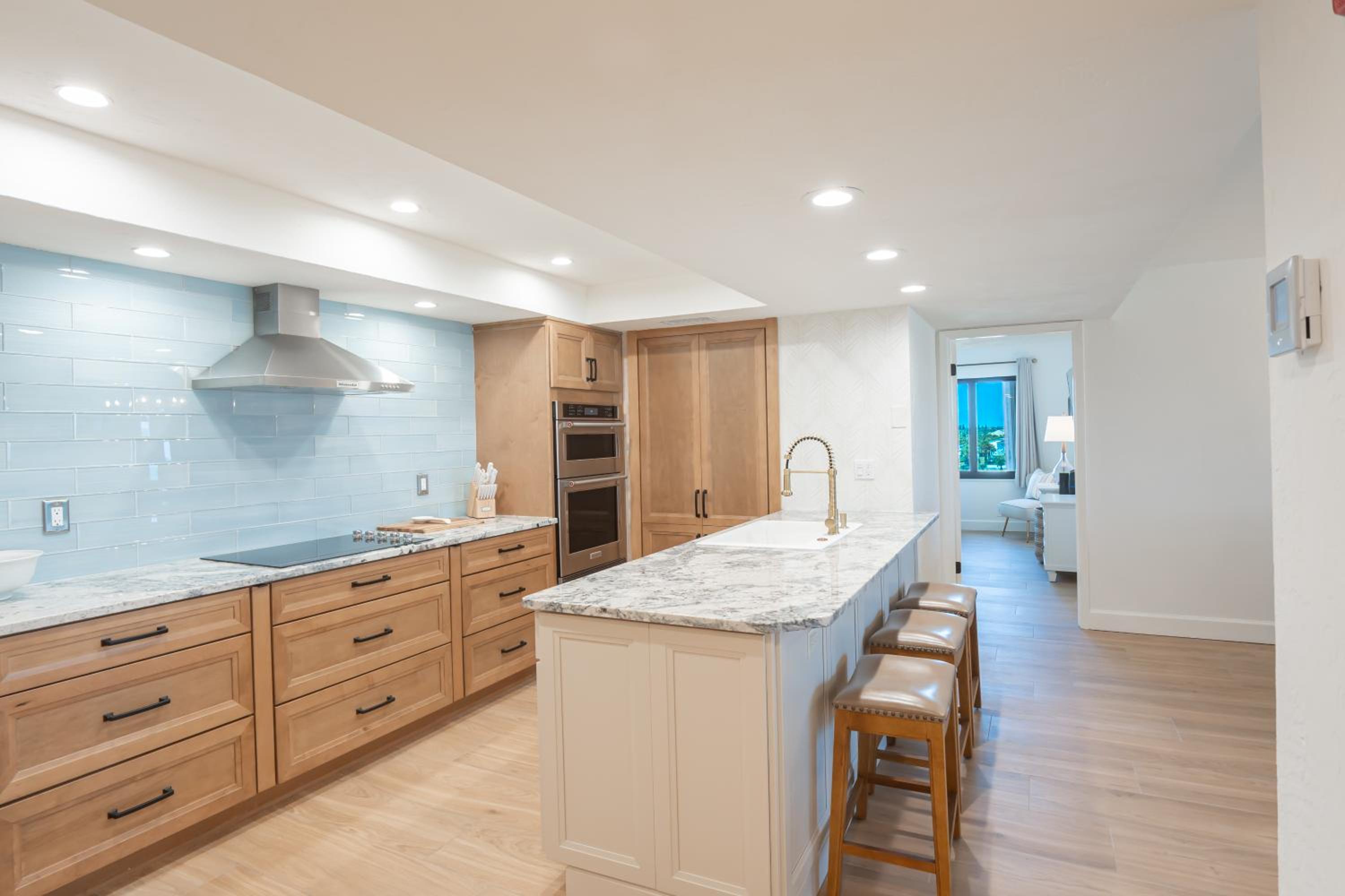 Luxury direct oceanfront corner with a large private balcony, heated pool and garage