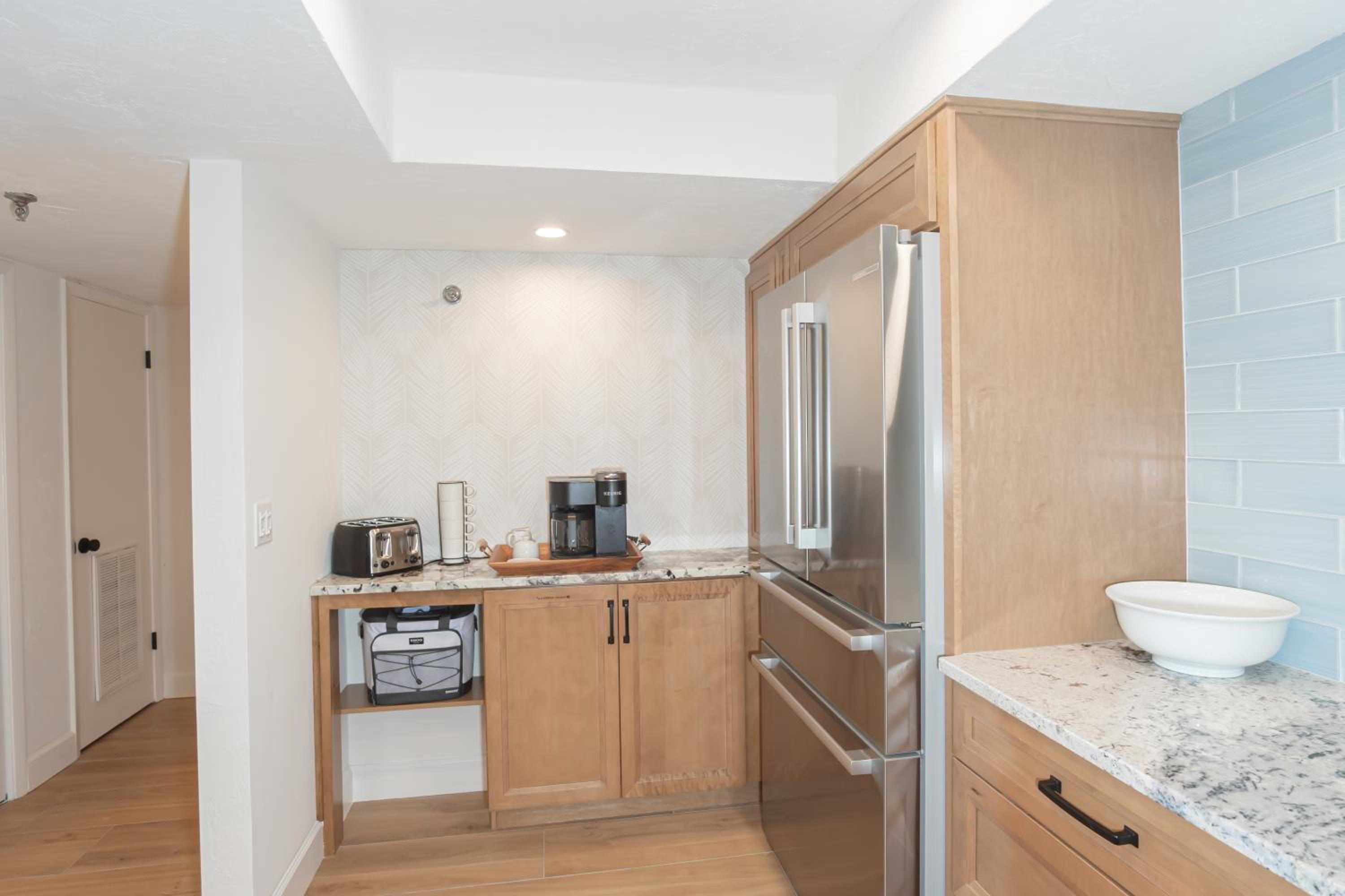 Luxury direct oceanfront corner with a large private balcony, heated pool and garage
