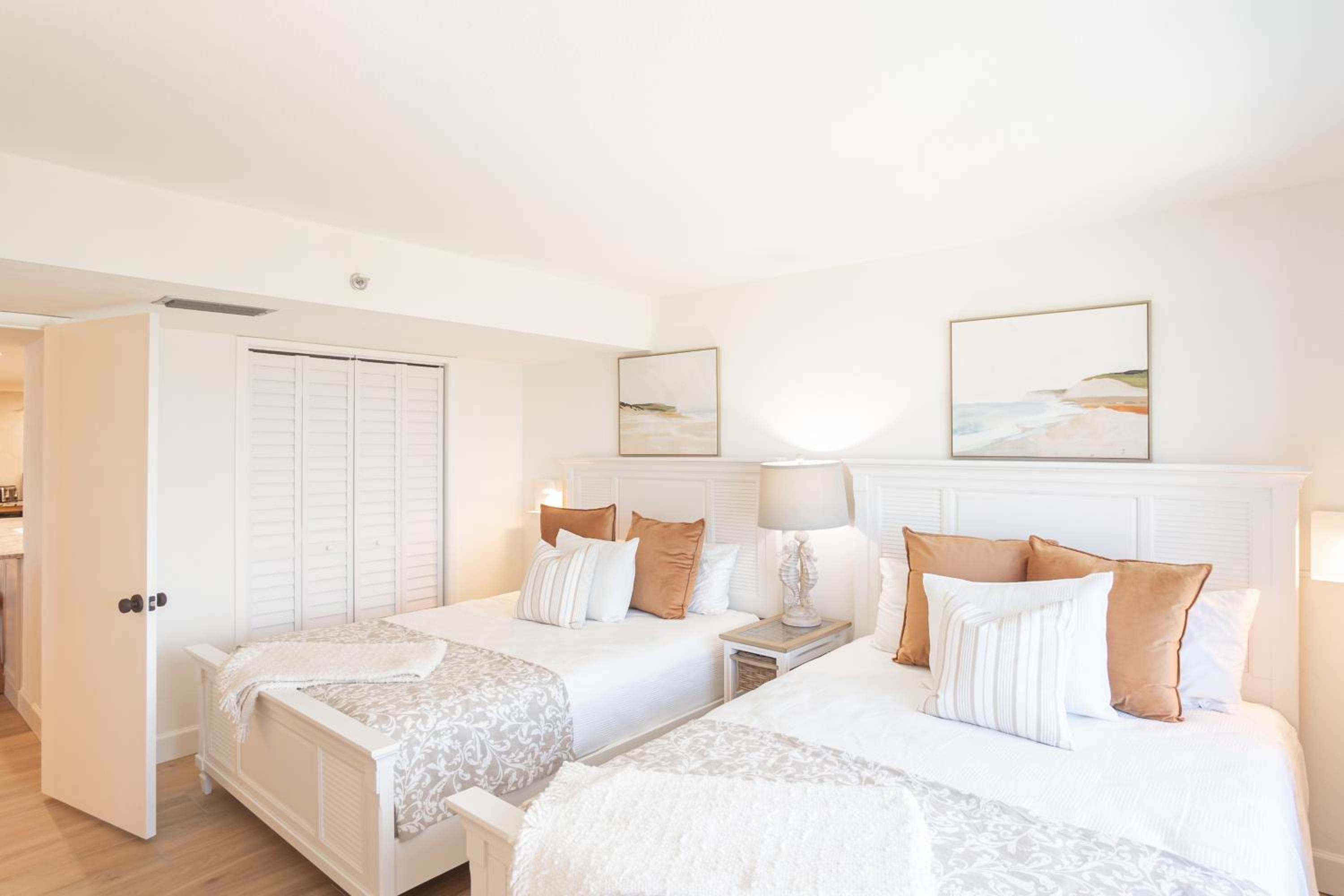 Luxury direct oceanfront corner with a large private balcony, heated pool and garage