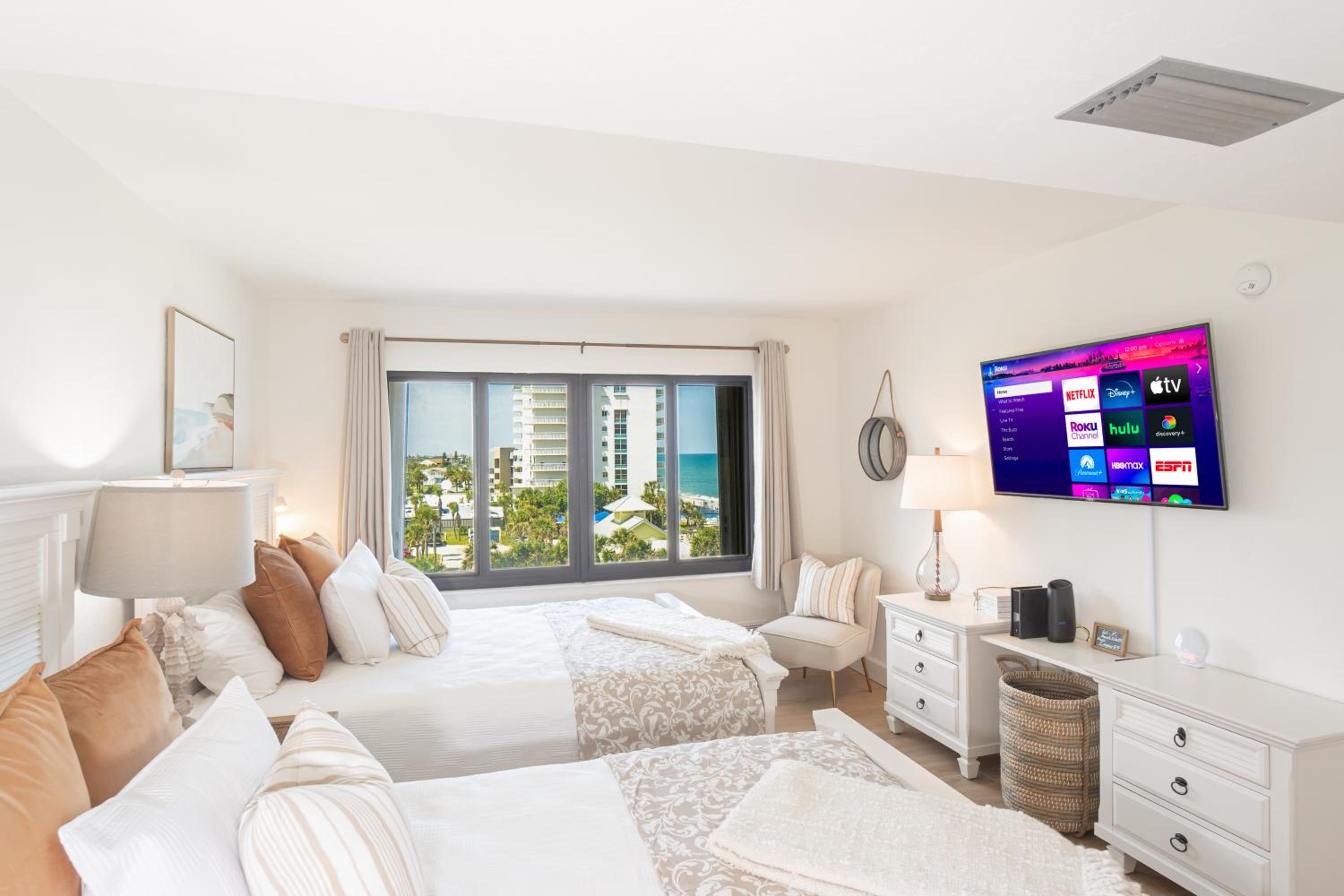 Luxury direct oceanfront corner with a large private balcony, heated pool and garage