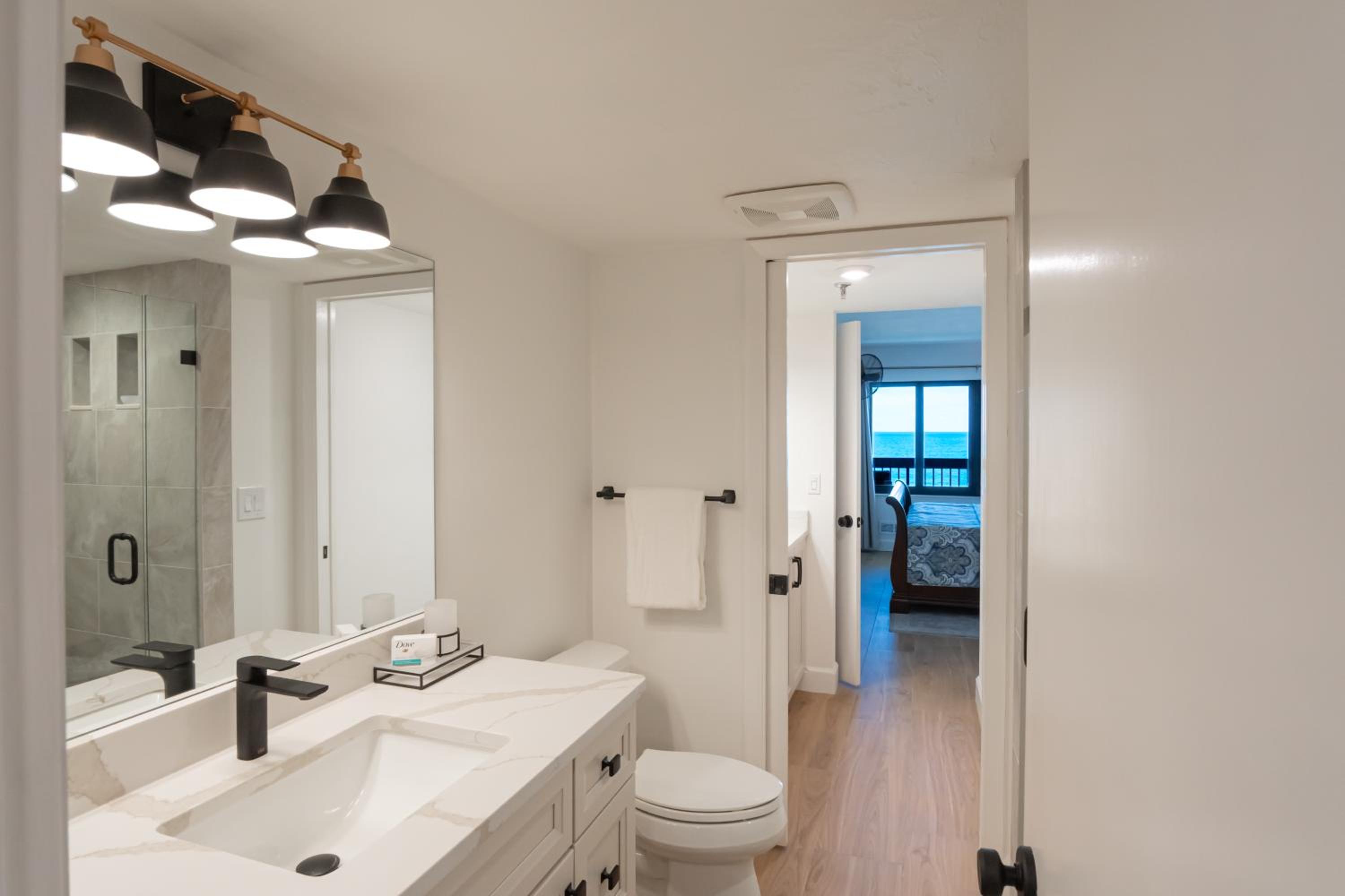 Luxury direct oceanfront corner with a large private balcony, heated pool and garage
