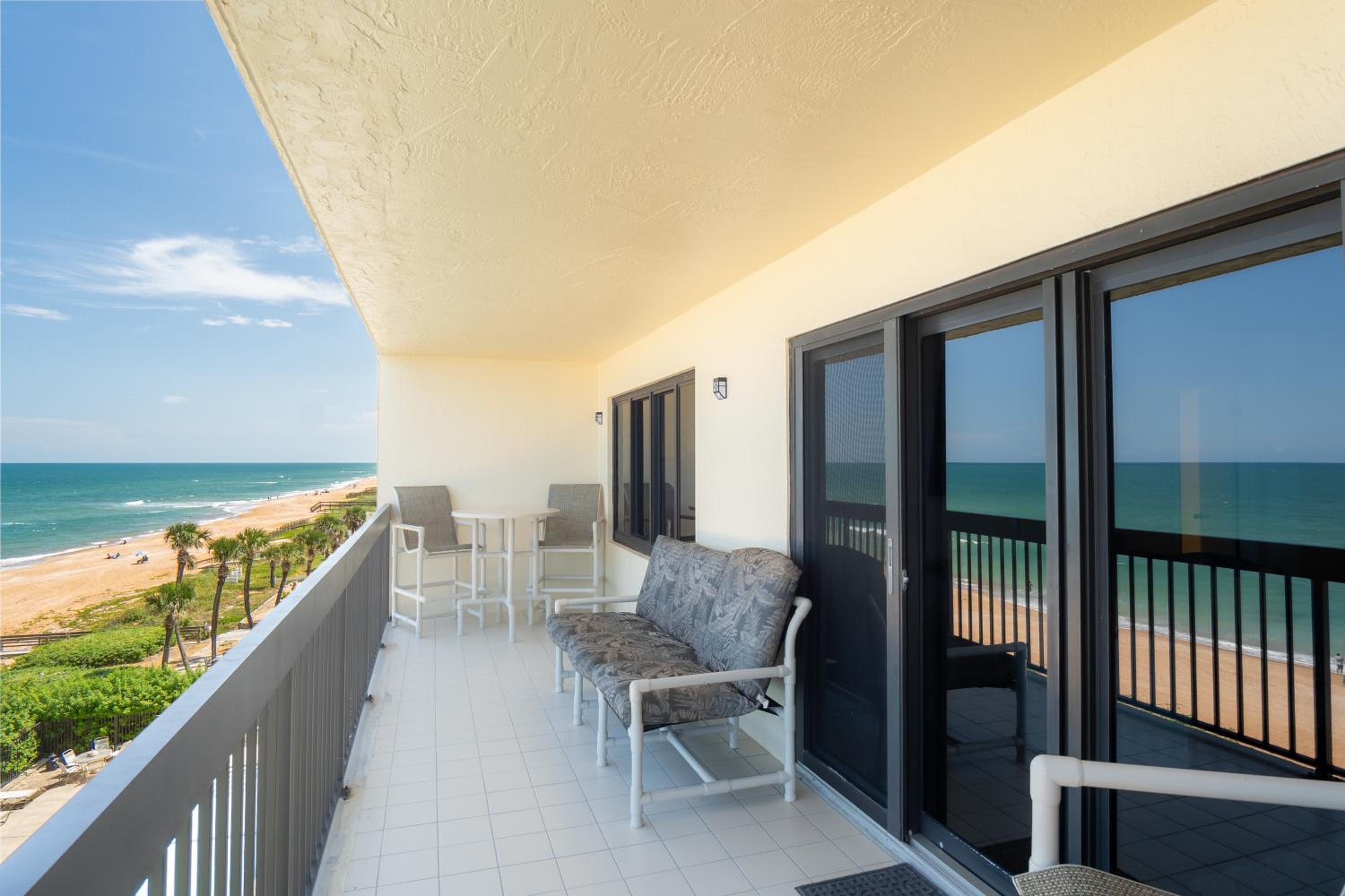 Luxury direct oceanfront corner with a large private balcony, heated pool and garage