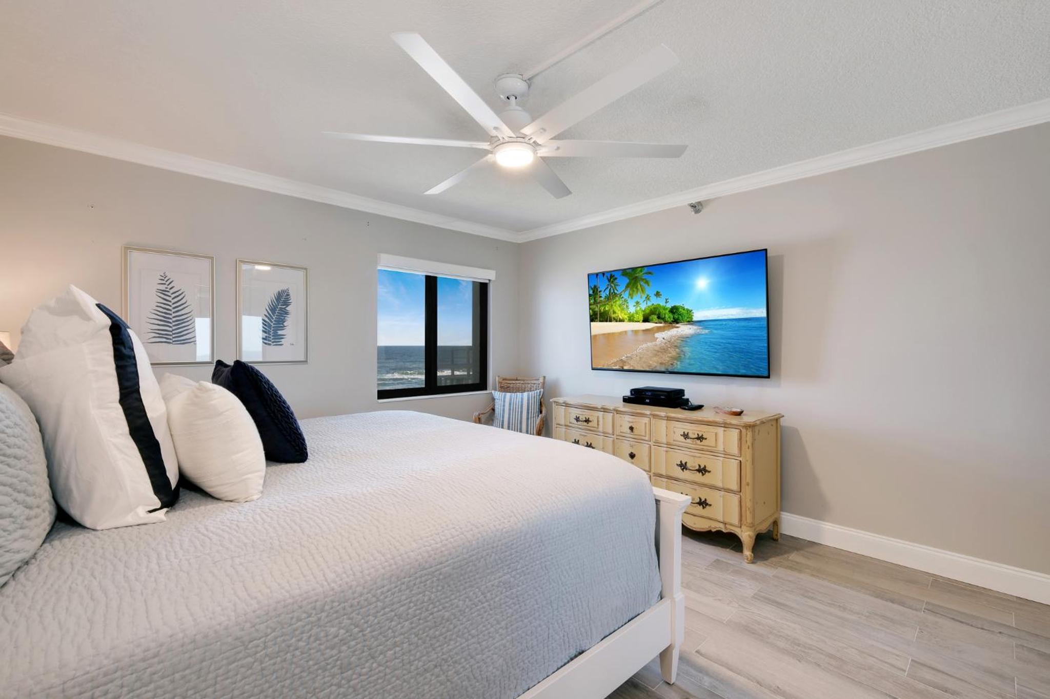 Updated direct oceanfront condo with a balcony, beachfront heated pool and beach access