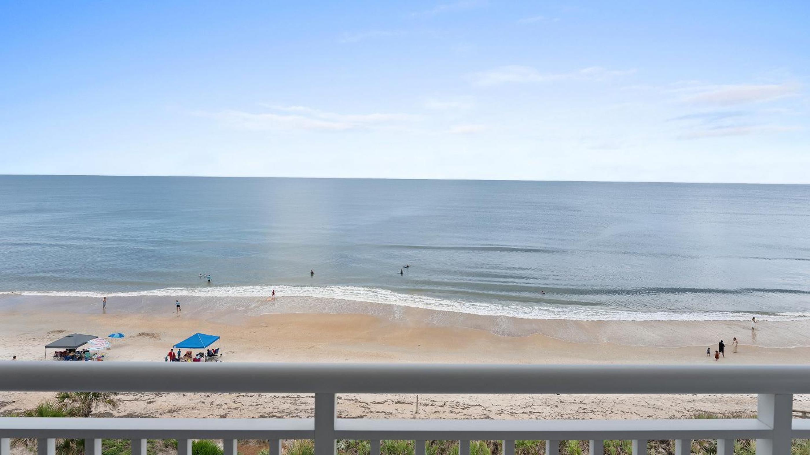 Luxury, direct oceanfront top-floor corner with wrap-around balcony and heated pool