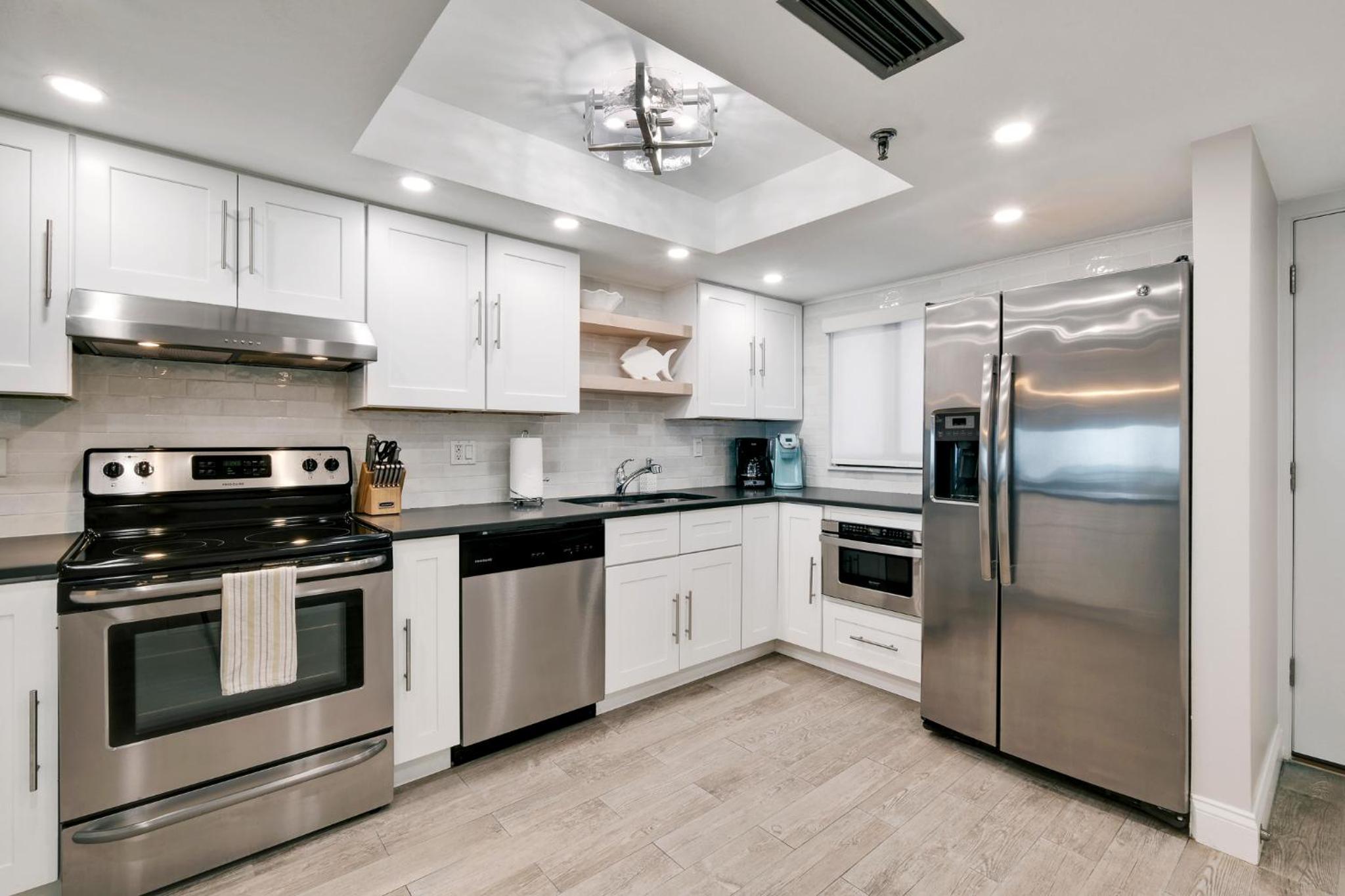 Updated direct oceanfront condo with a balcony, beachfront heated pool and beach access