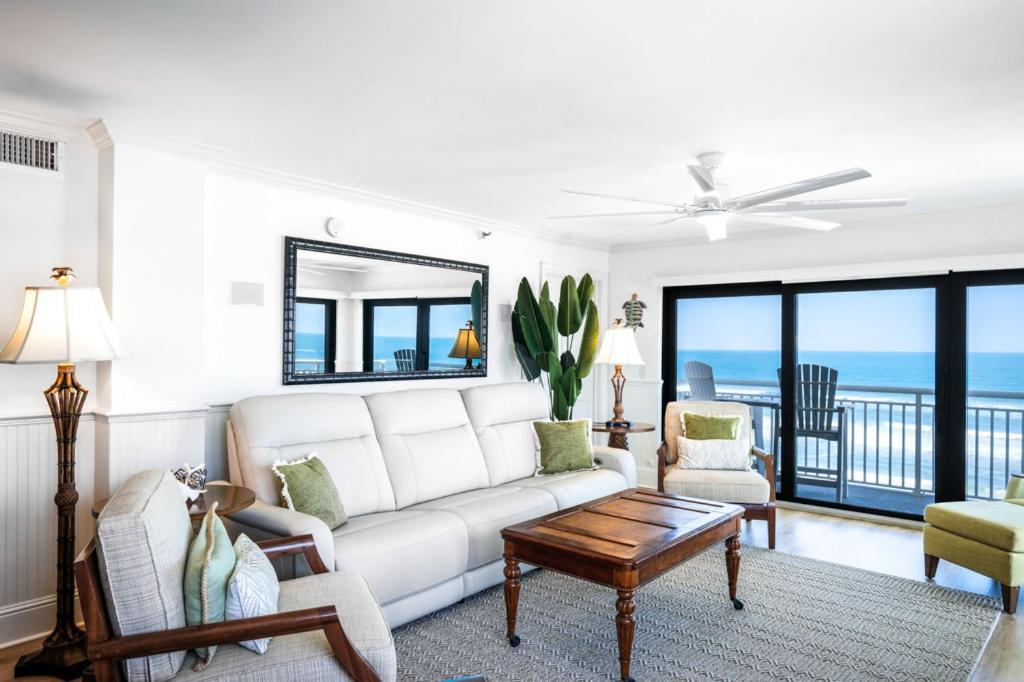 Luxury, direct oceanfront top-floor corner with wrap-around balcony and heated pool