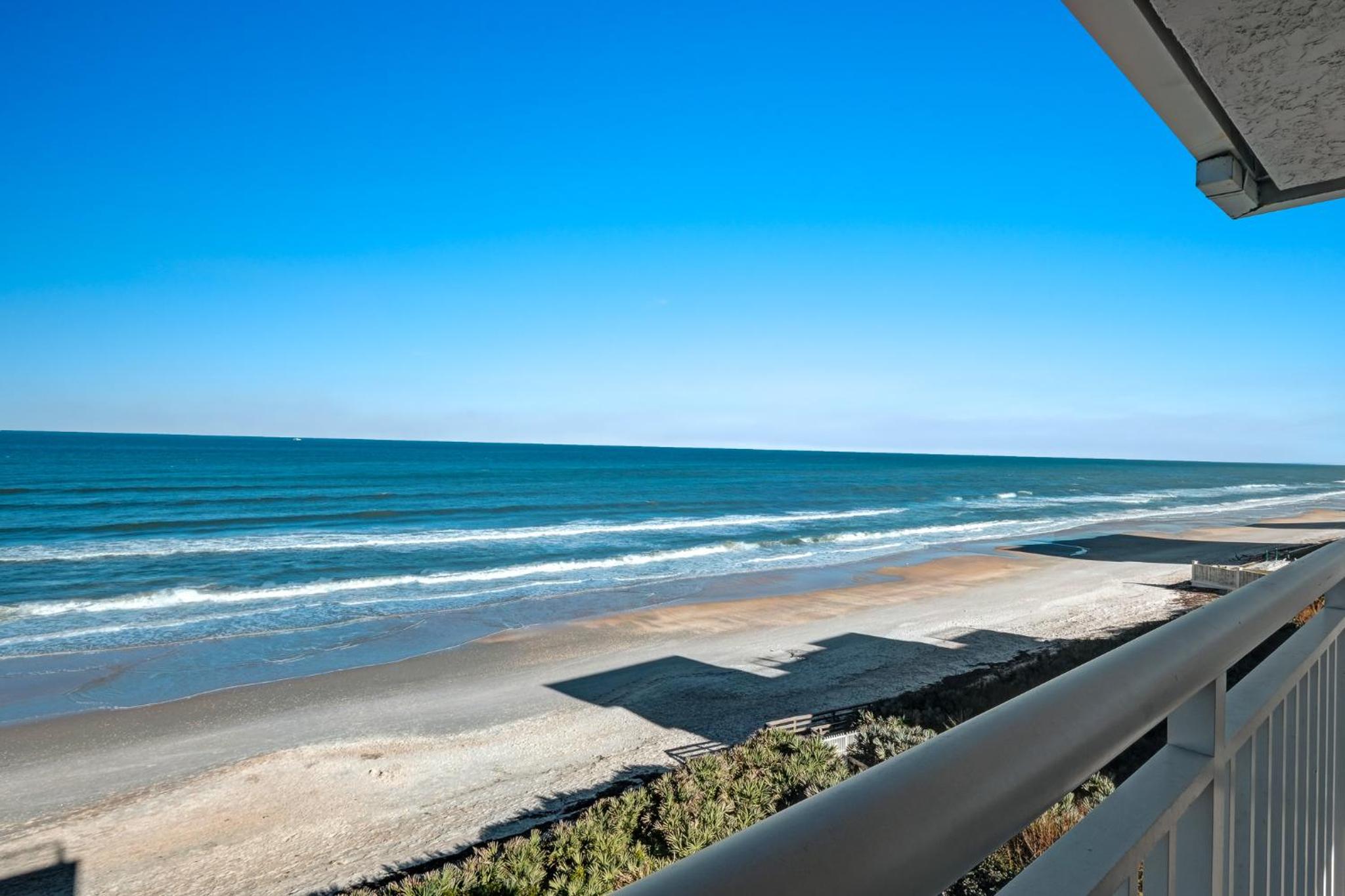 Luxury, direct oceanfront top-floor corner with wrap-around balcony and heated pool