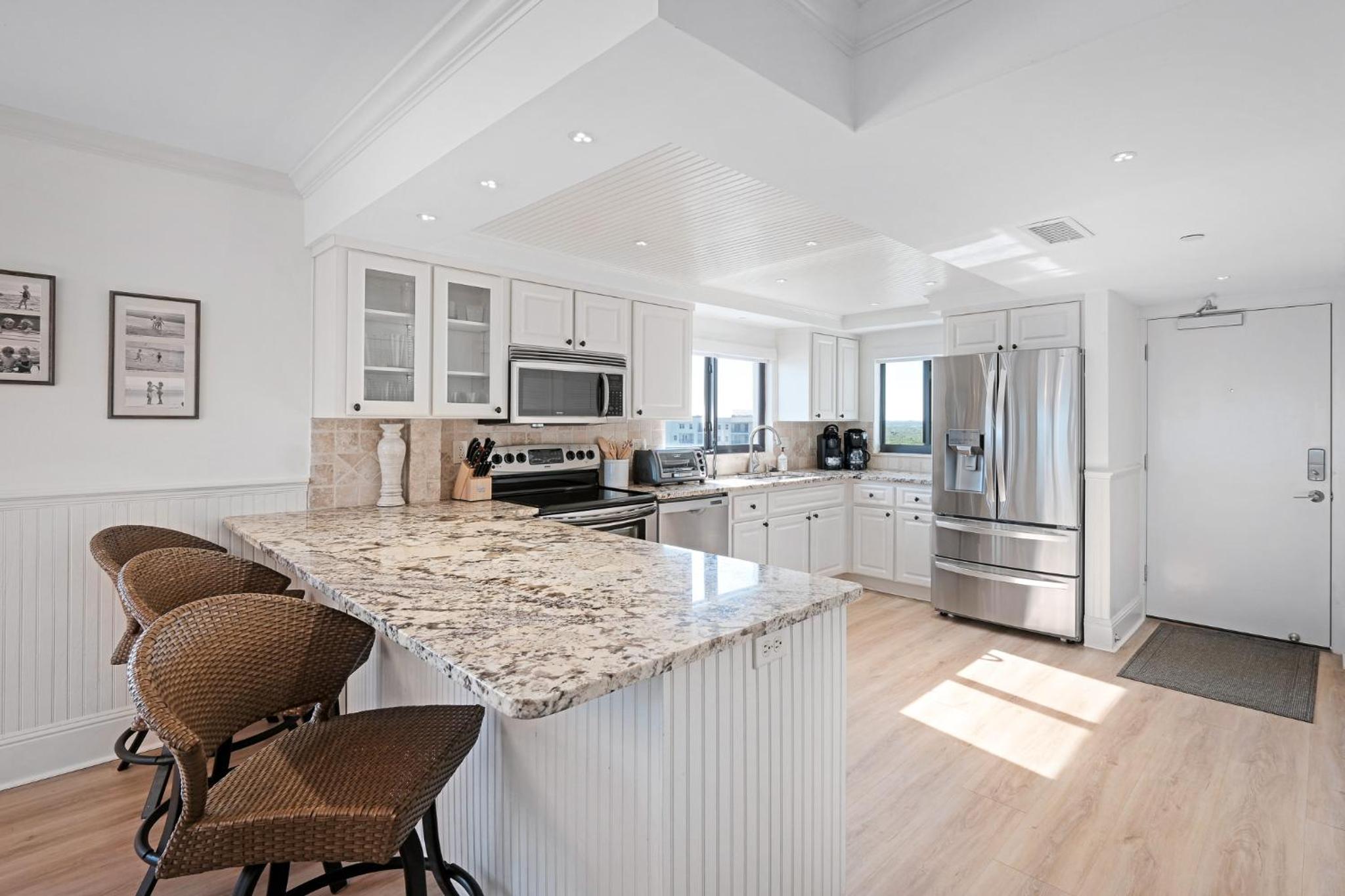 Luxury, direct oceanfront top-floor corner with wrap-around balcony and heated pool