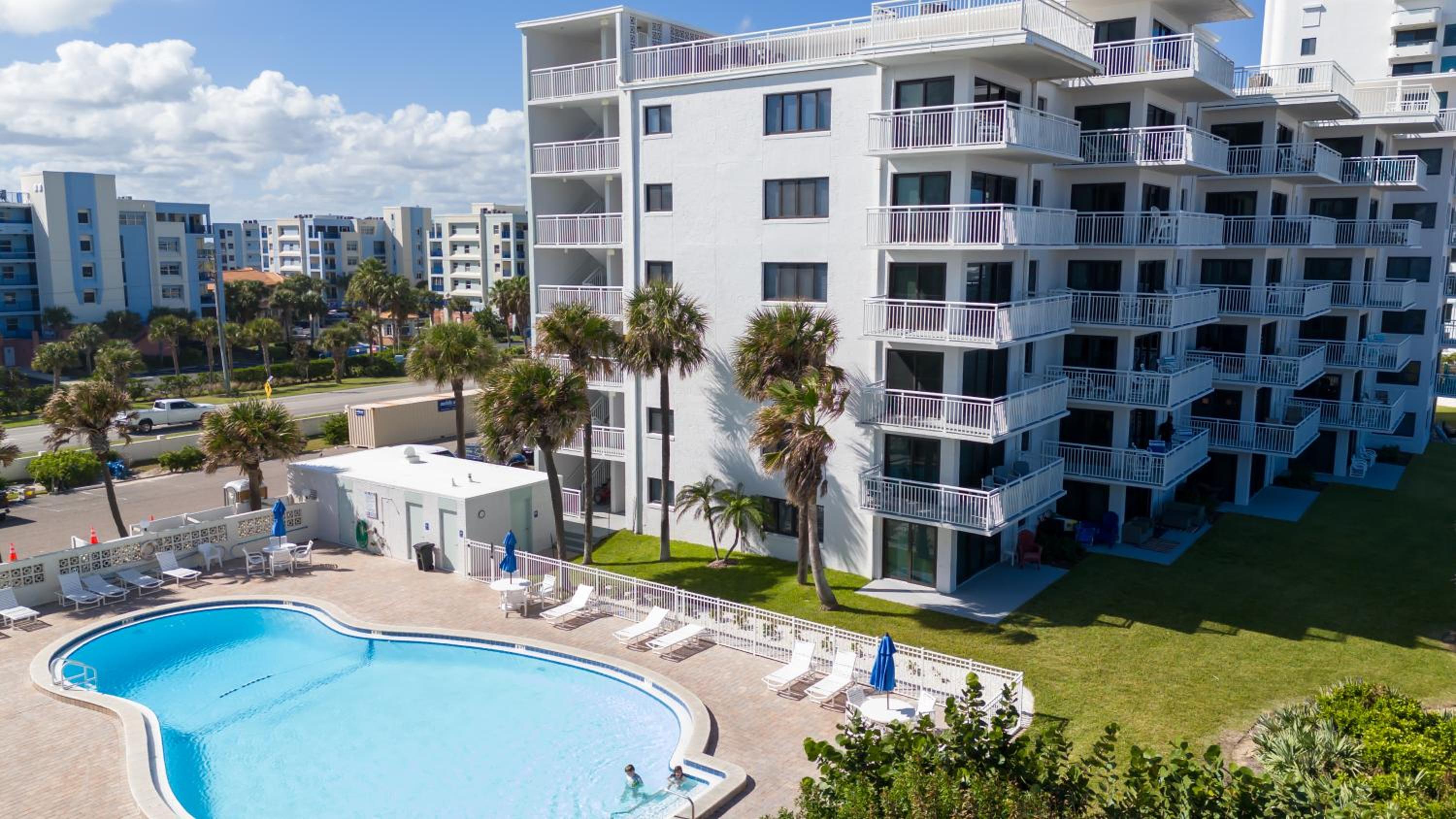 Luxury, direct oceanfront top-floor corner with wrap-around balcony and heated pool