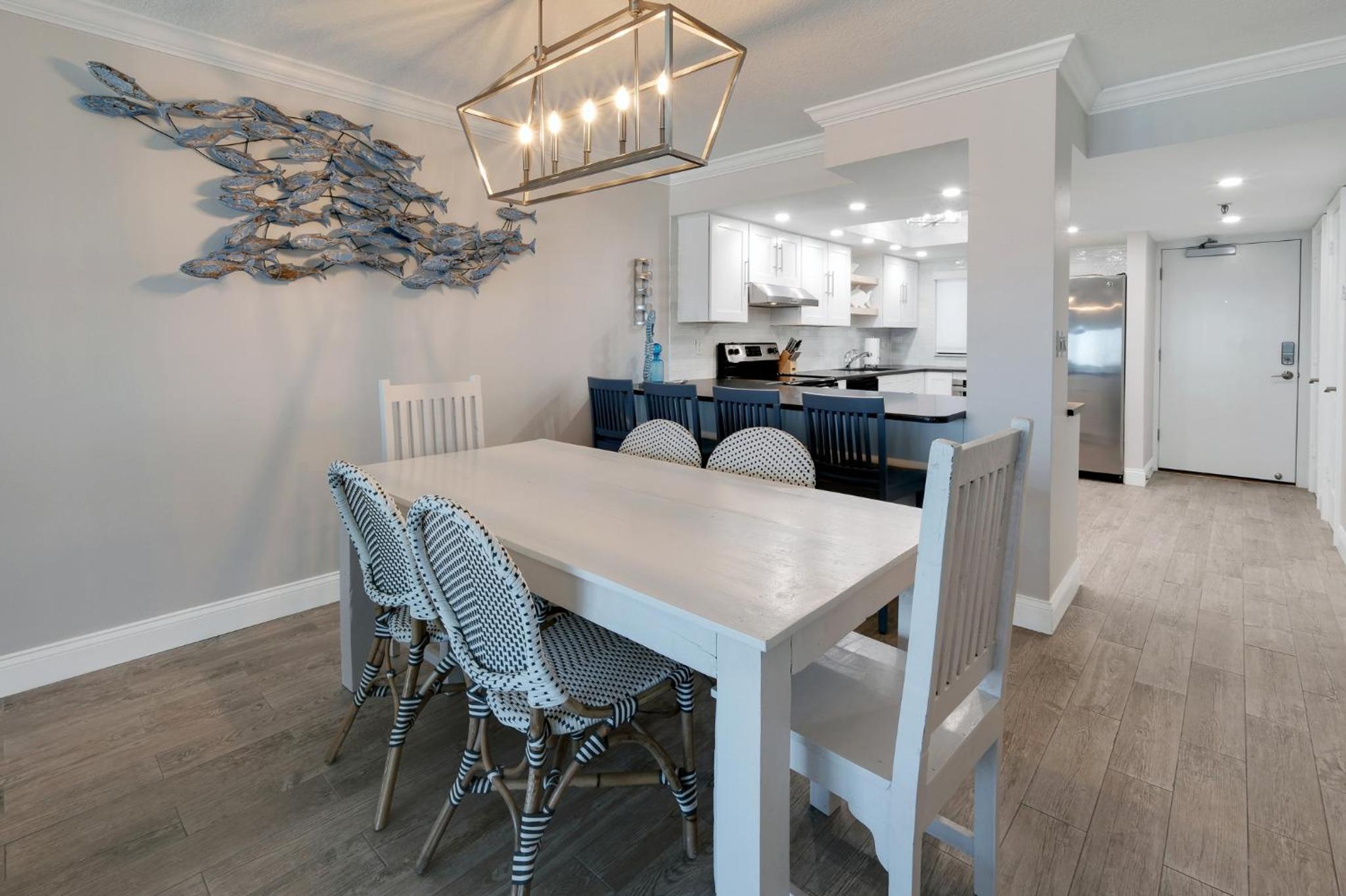 Updated direct oceanfront condo with a balcony, beachfront heated pool and beach access