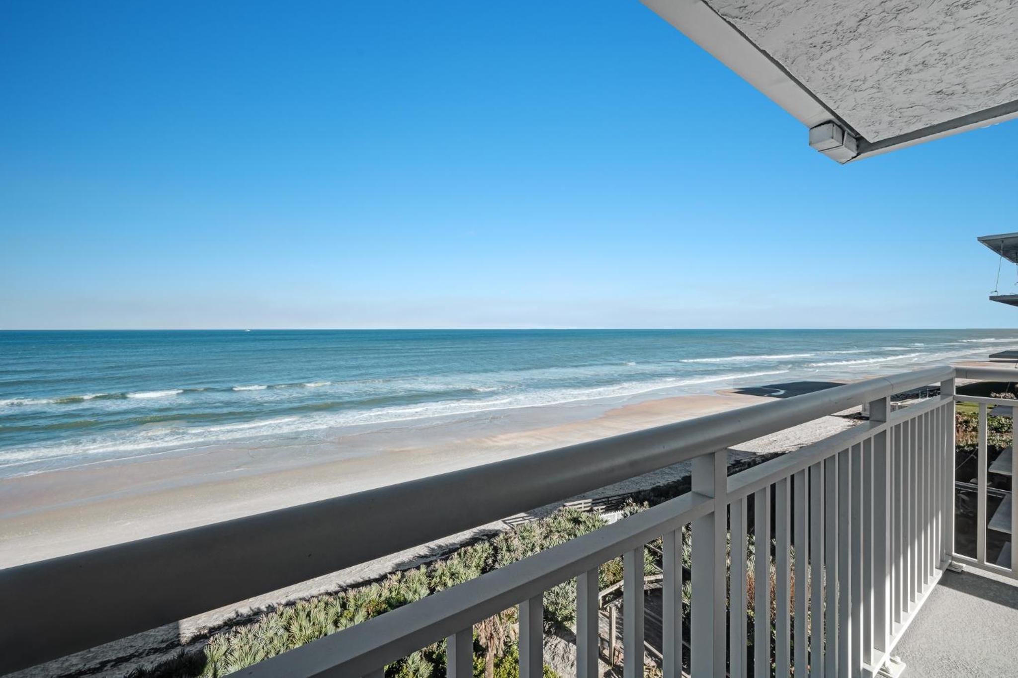 Luxury, direct oceanfront top-floor corner with wrap-around balcony and heated pool