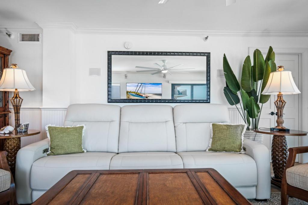 Luxury, direct oceanfront top-floor corner with wrap-around balcony and heated pool
