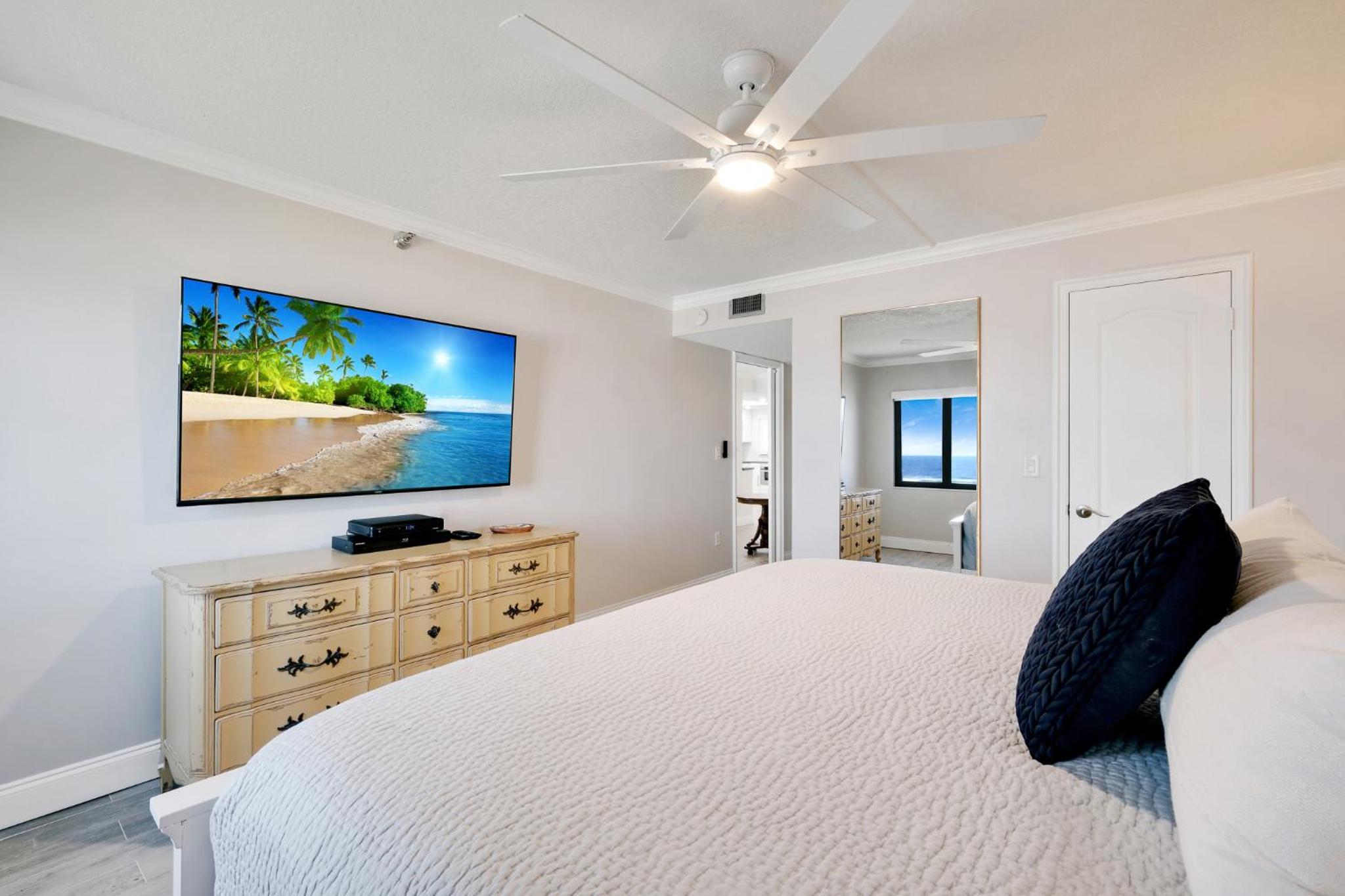 Updated direct oceanfront condo with a balcony, beachfront heated pool and beach access