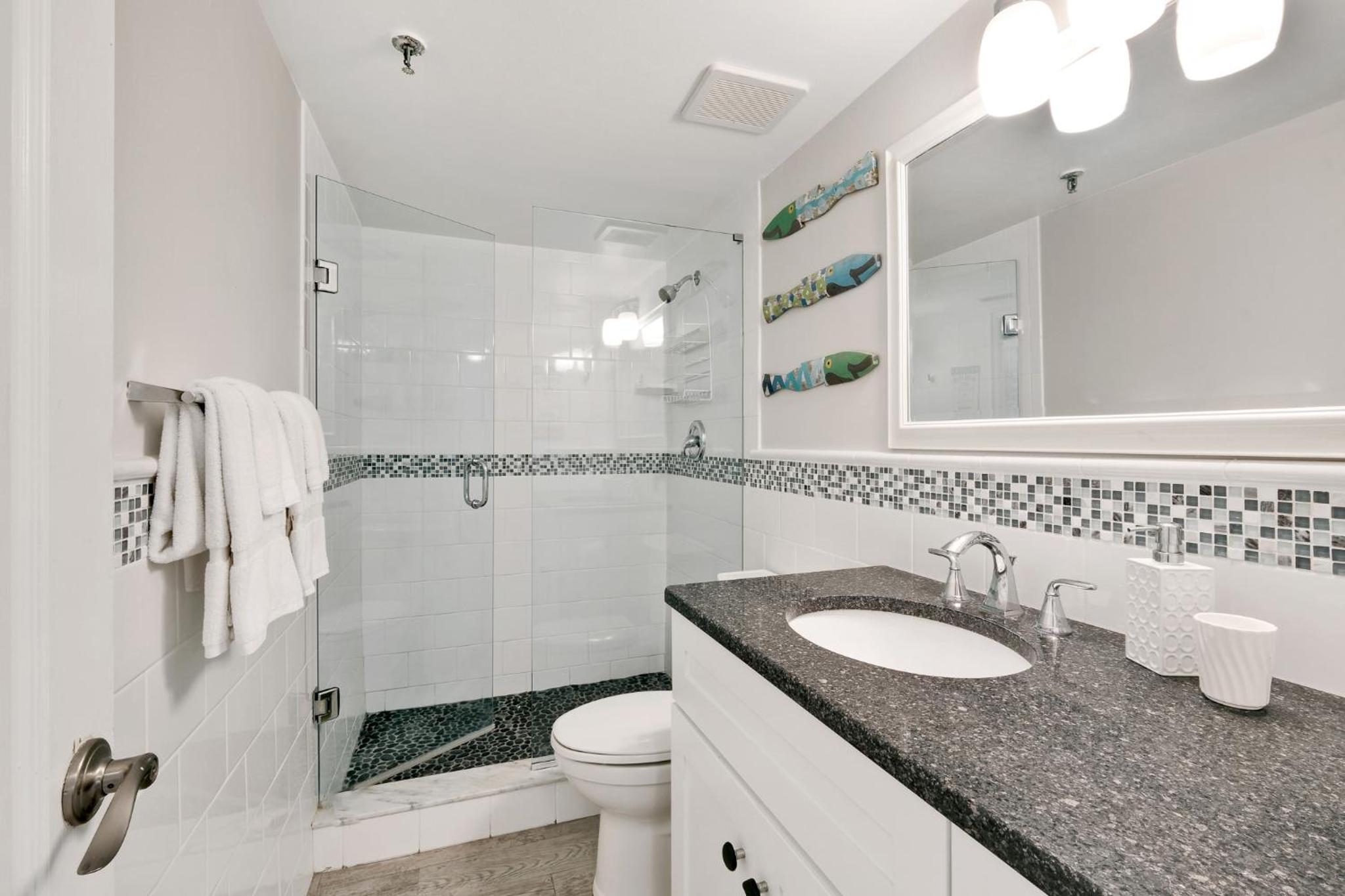 Updated direct oceanfront condo with a balcony, beachfront heated pool and beach access