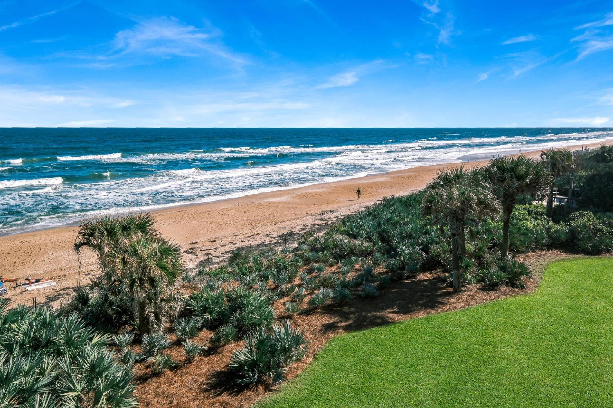 Updated direct oceanfront condo with a balcony, beachfront heated pool and beach access