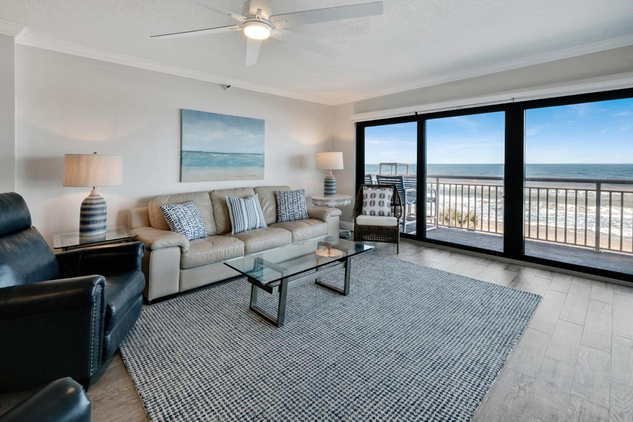 Updated direct oceanfront condo with a balcony, beachfront heated pool and beach access