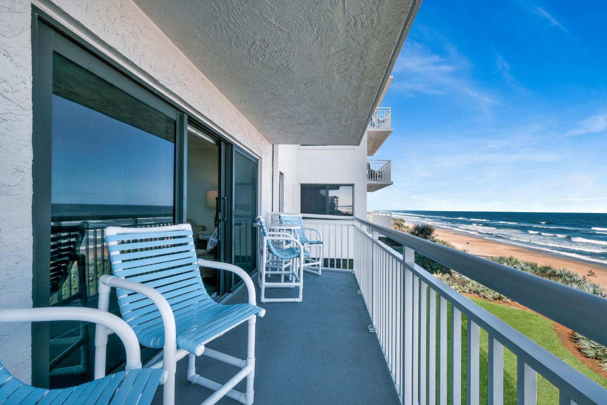 Updated direct oceanfront condo with a balcony, beachfront heated pool and beach access