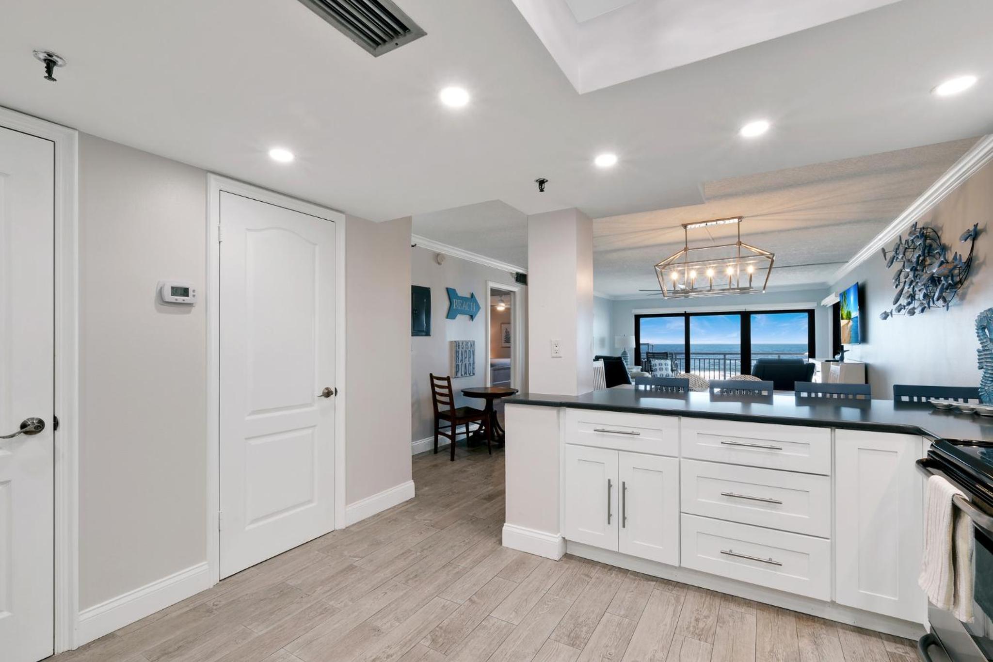 Updated direct oceanfront condo with a balcony, beachfront heated pool and beach access