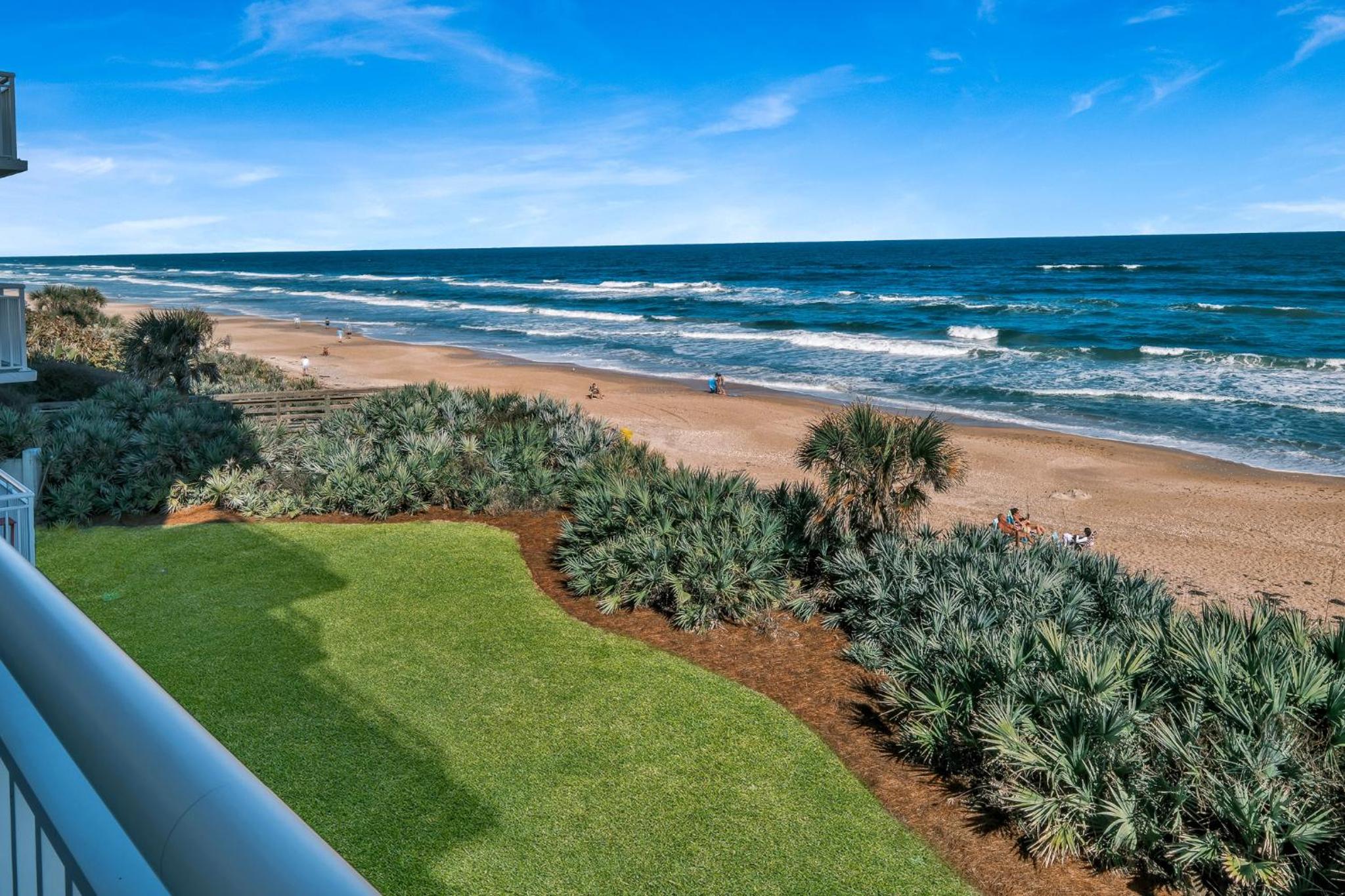 Updated direct oceanfront condo with a balcony, beachfront heated pool and beach access