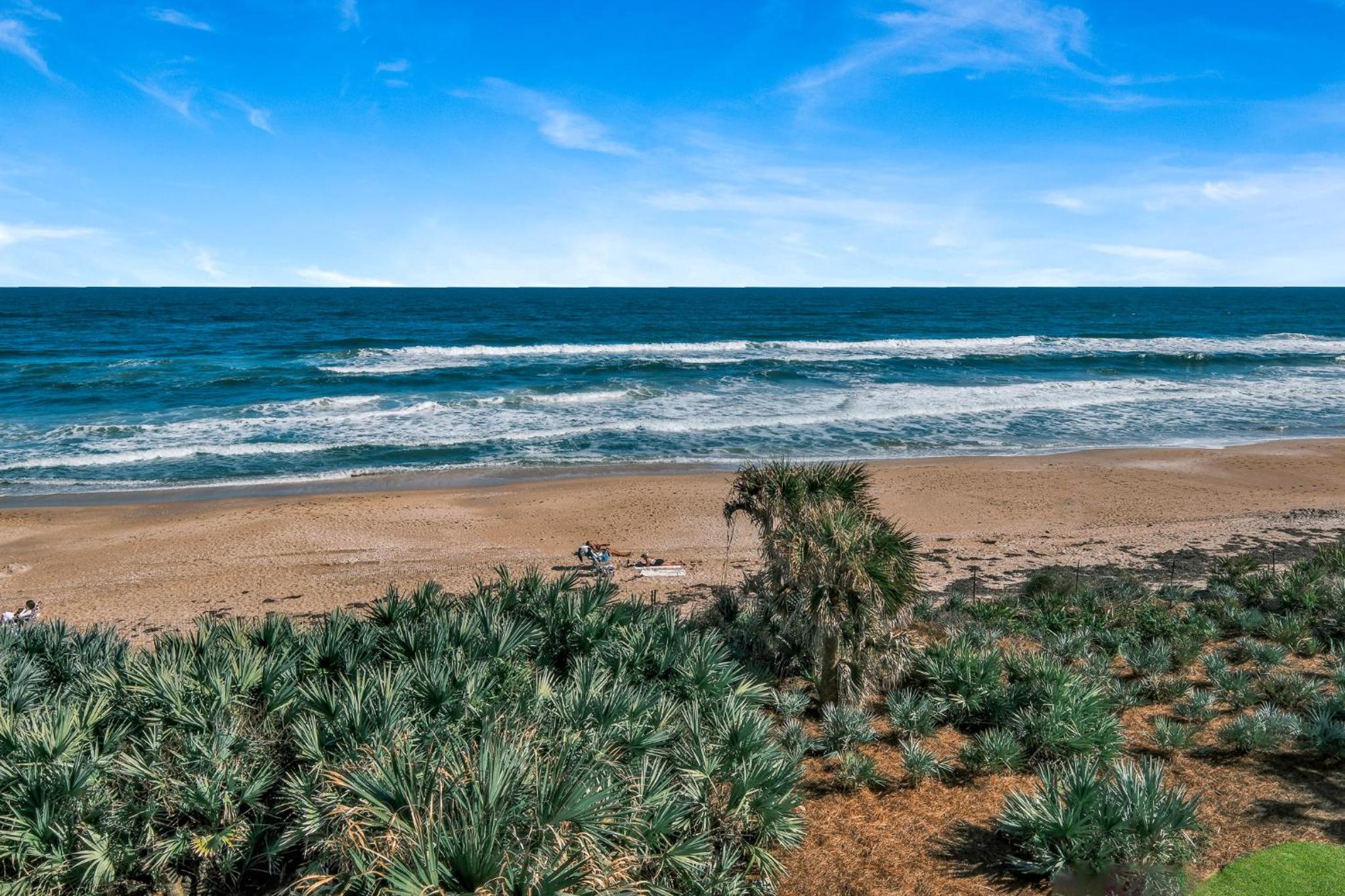 Updated direct oceanfront condo with a balcony, beachfront heated pool and beach access