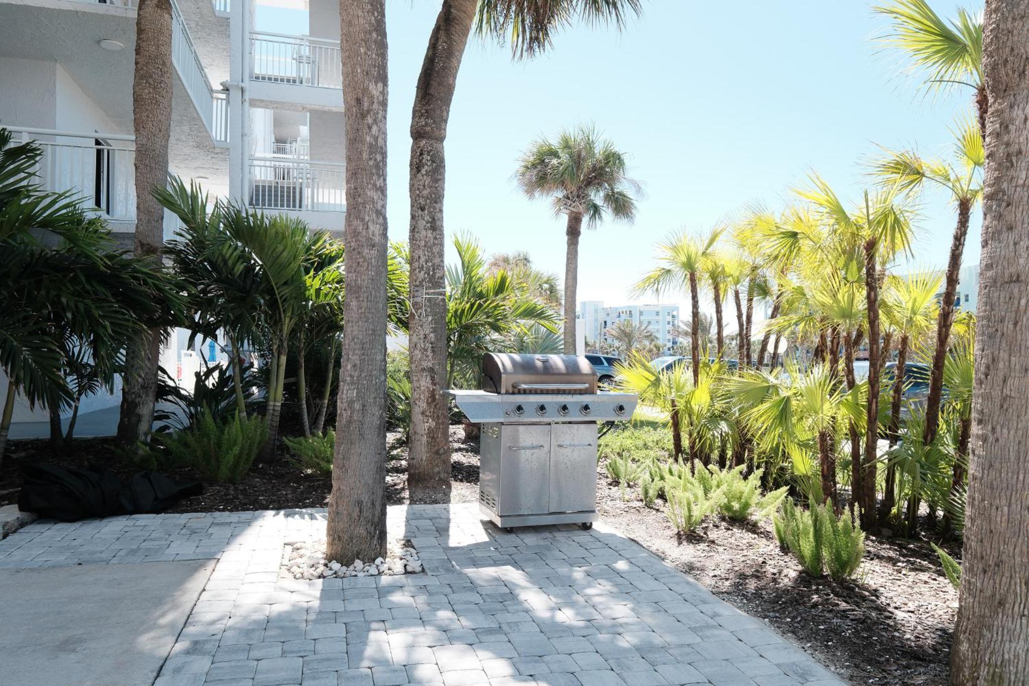 Updated direct oceanfront condo with a balcony, beachfront heated pool and beach access