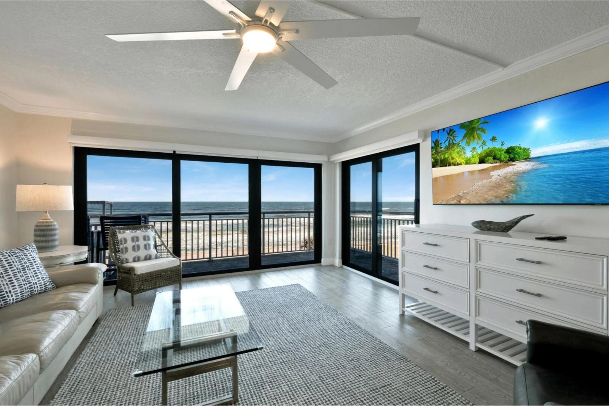 Updated direct oceanfront condo with a balcony, beachfront heated pool and beach access