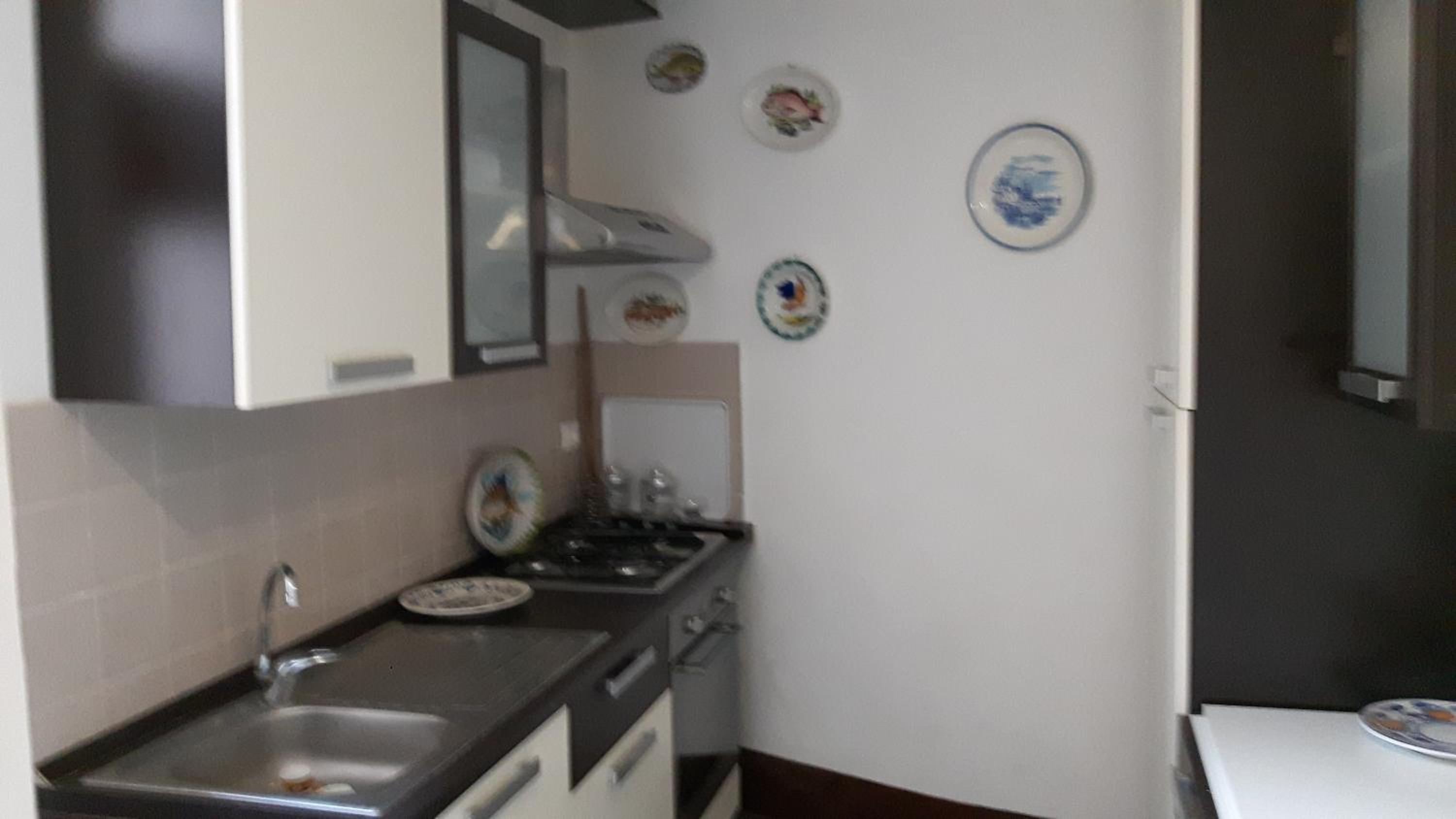 Antico Ormeggio en Aci Castello — kitchen
