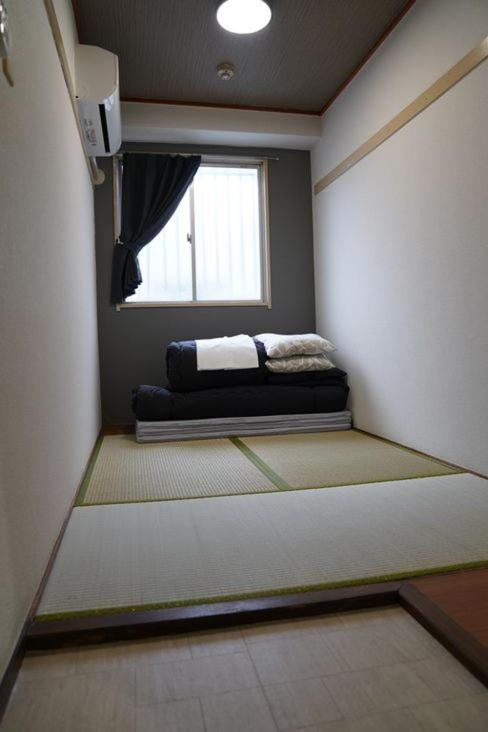 心斎橋難波関空直通Nambaminami Shin-Imamiya Ambers Hostel