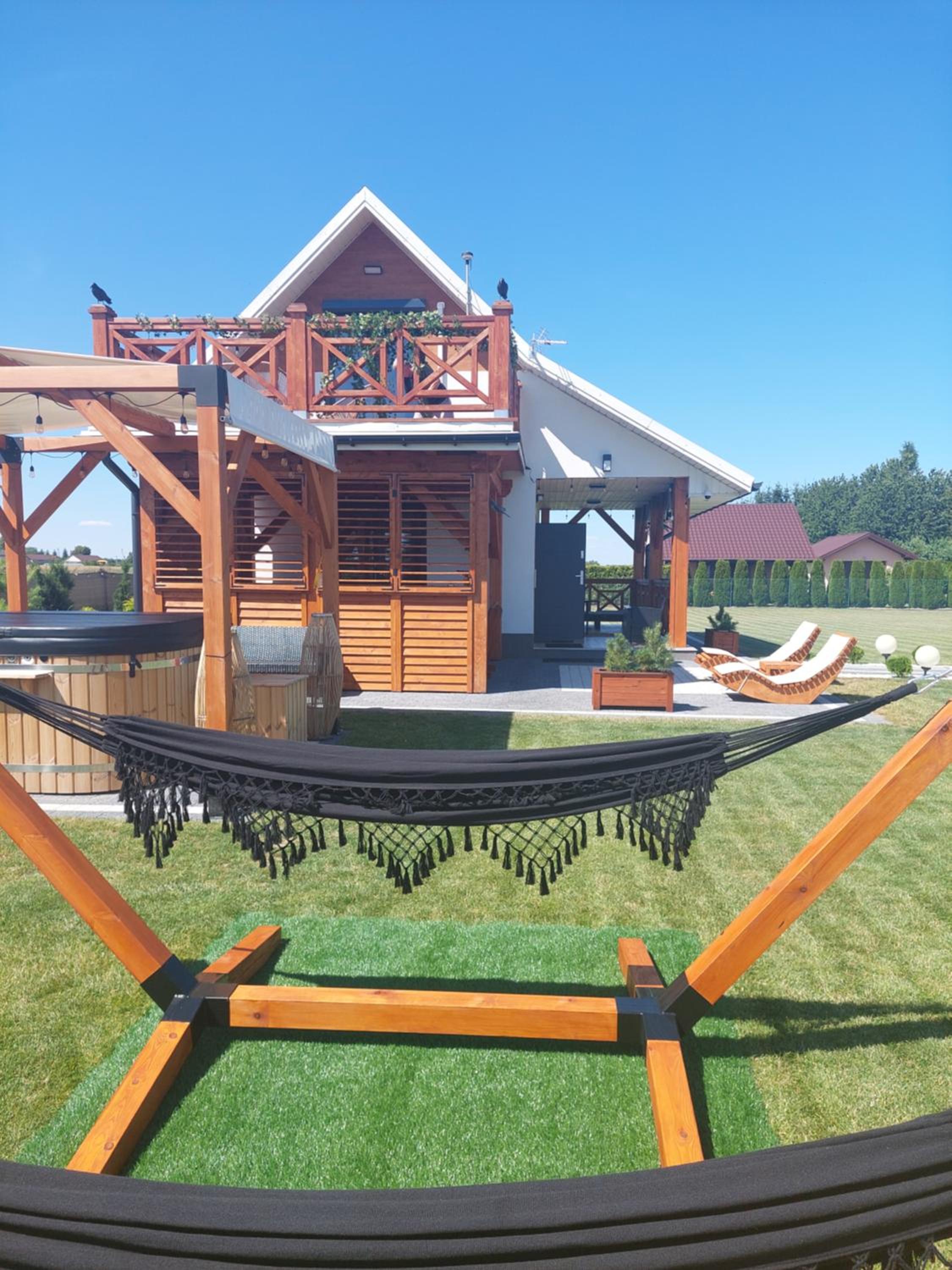 Domek NIVA z Jacuzzi i Widokiem na Zalew