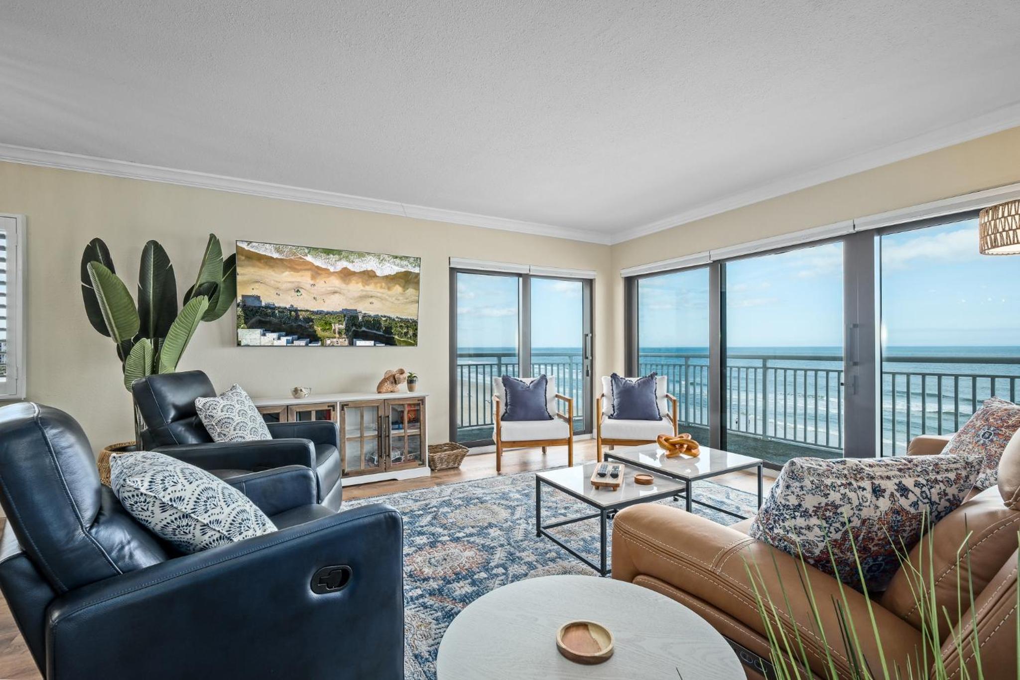 Renovated direct oceanfront corner condo with a huge wrap-around balcony and pool