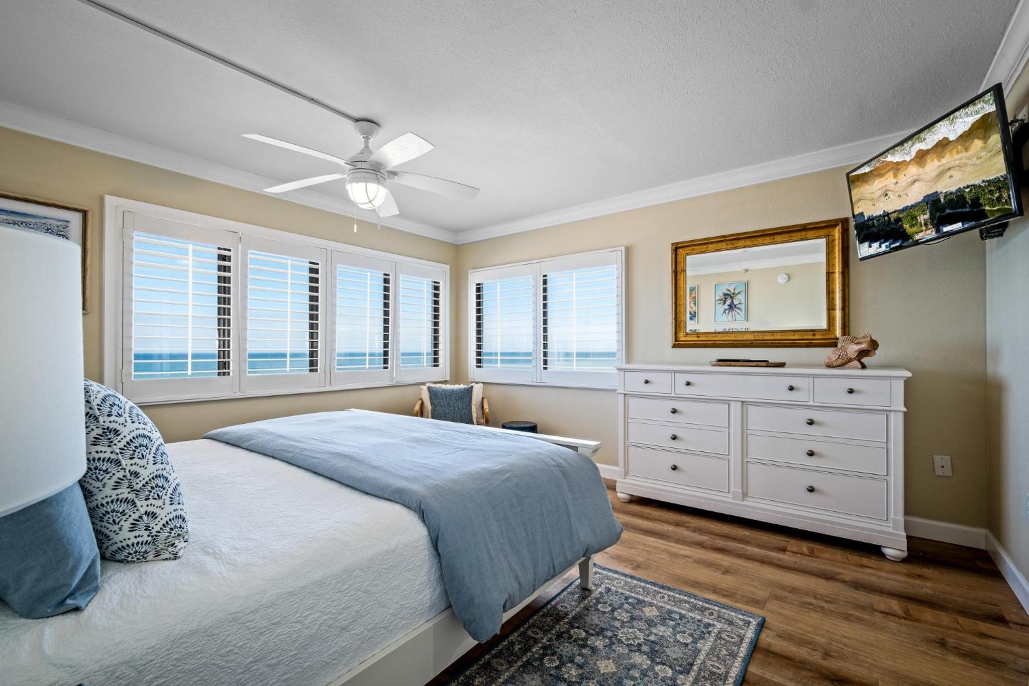 Renovated direct oceanfront corner condo with a huge wrap-around balcony and pool
