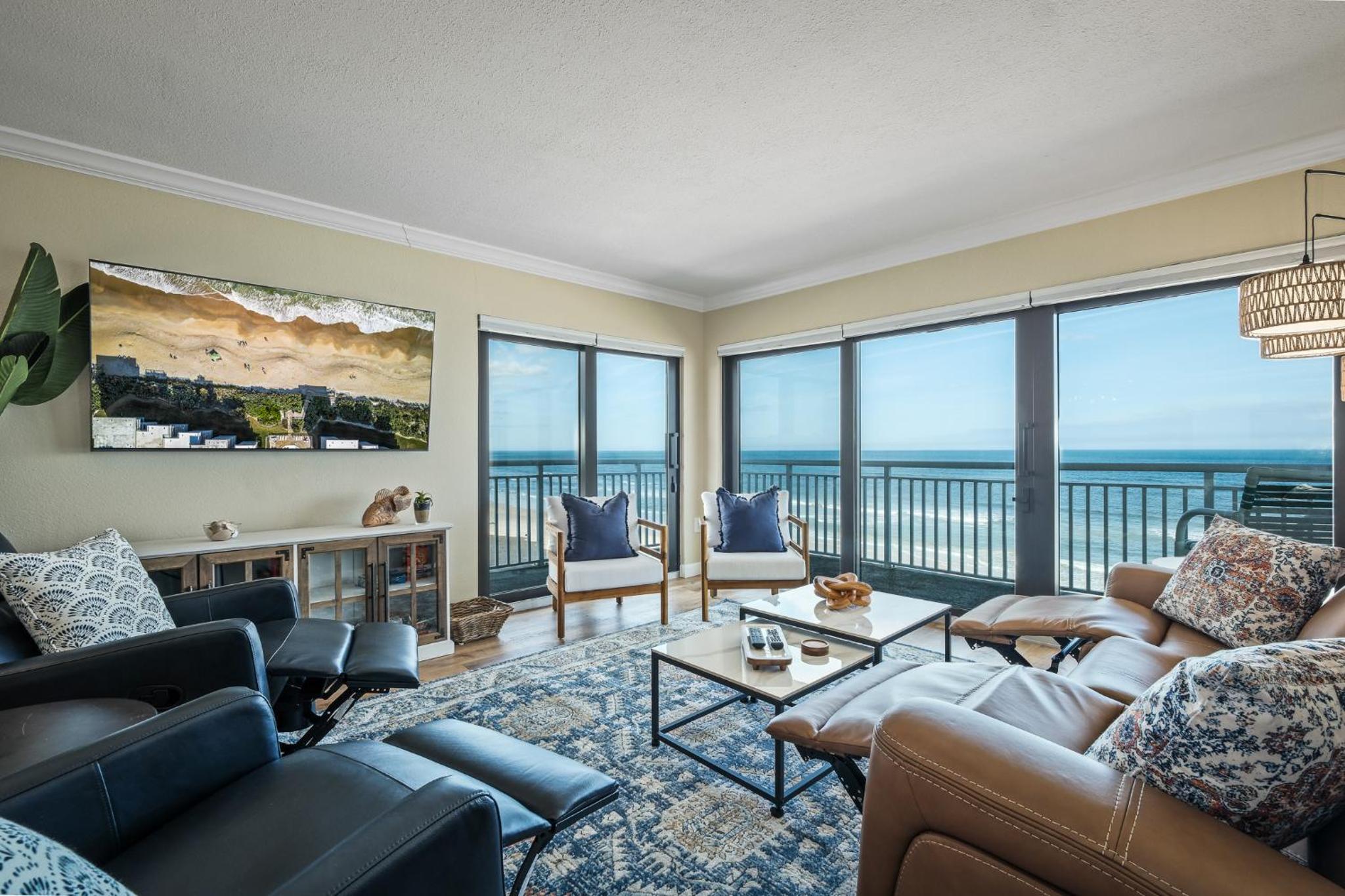 Renovated direct oceanfront corner condo with a huge wrap-around balcony and pool