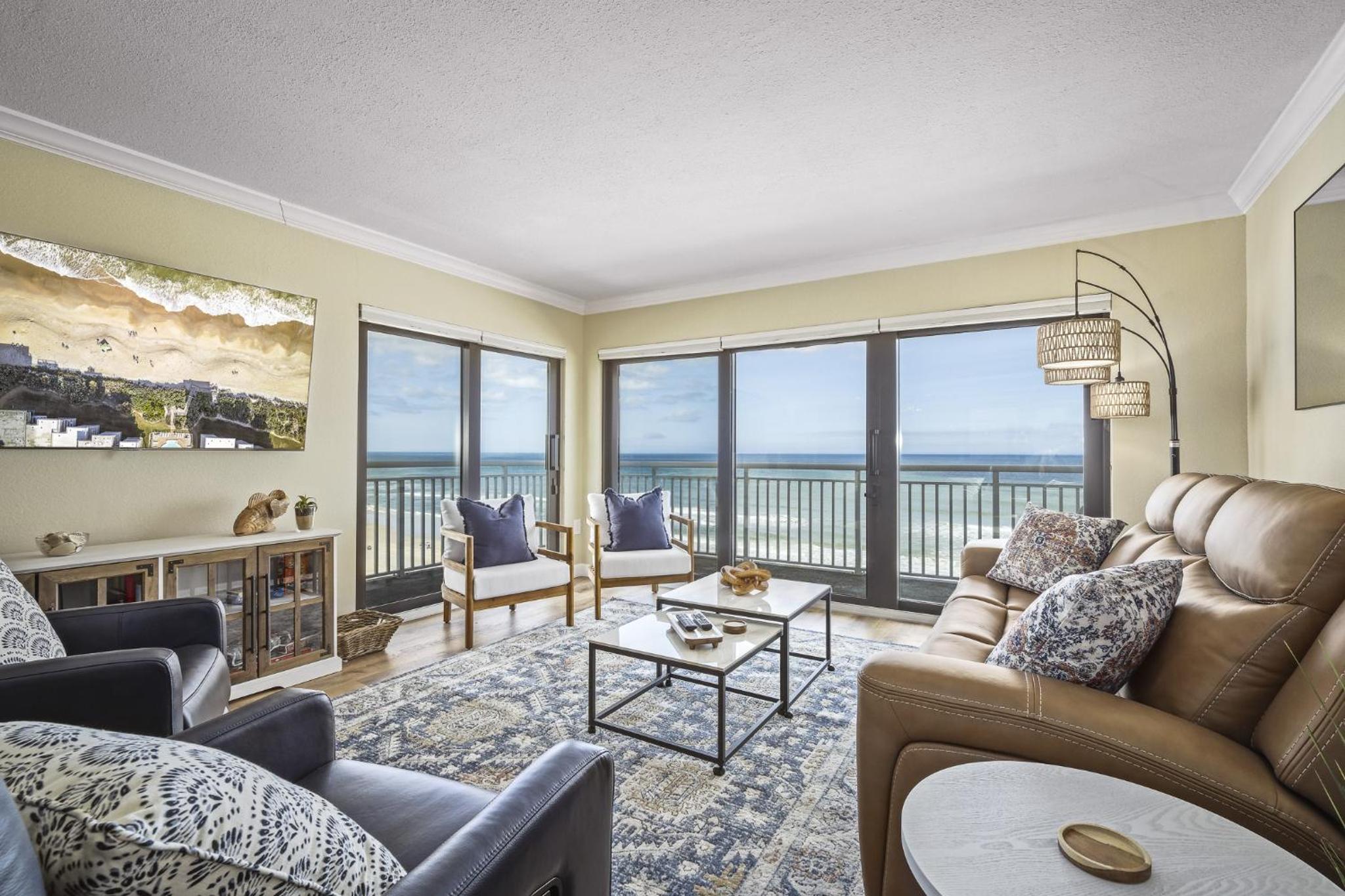 Renovated direct oceanfront corner condo with a huge wrap-around balcony and pool
