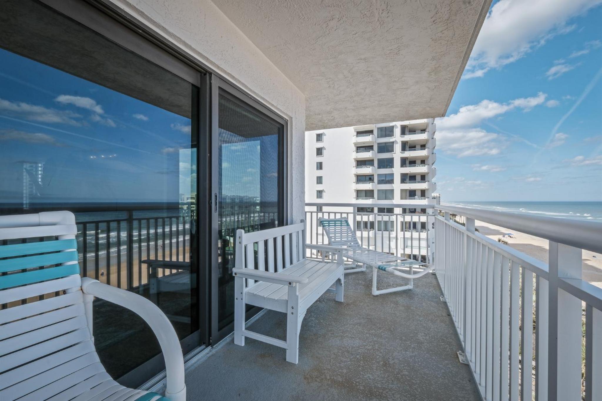 Renovated direct oceanfront corner condo with a huge wrap-around balcony and pool