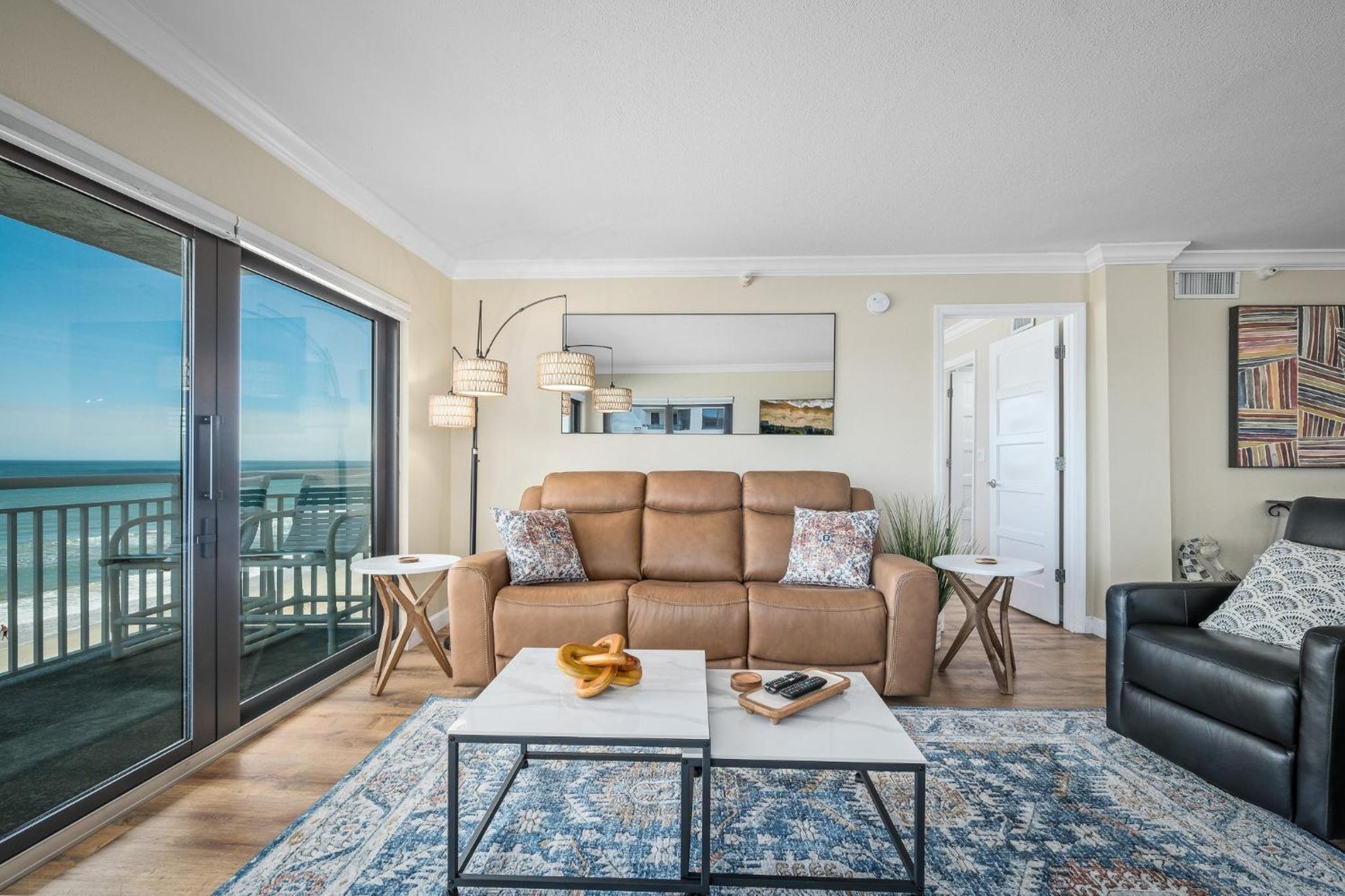 Renovated direct oceanfront corner condo with a huge wrap-around balcony and pool