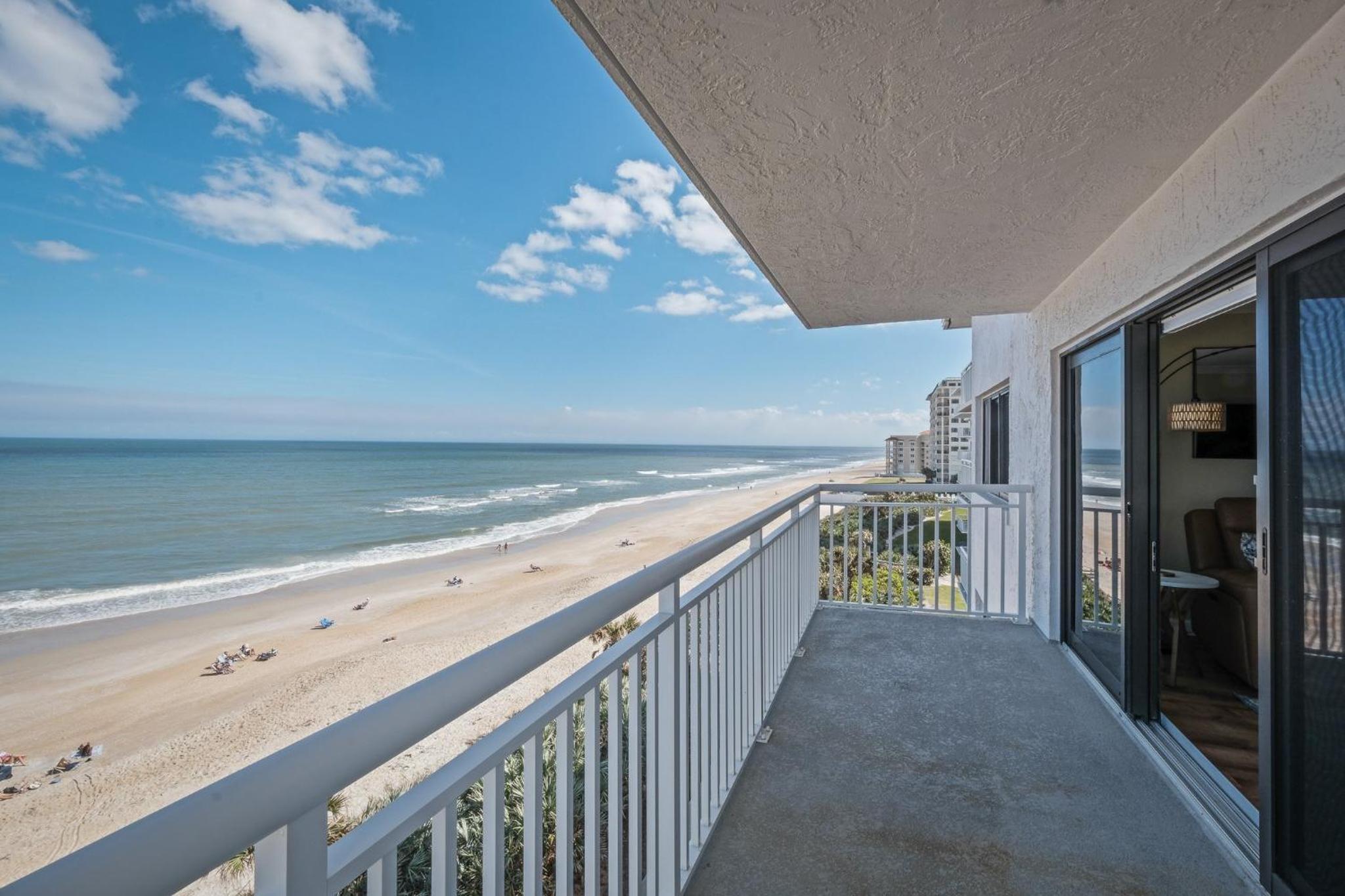 Renovated direct oceanfront corner condo with a huge wrap-around balcony and pool