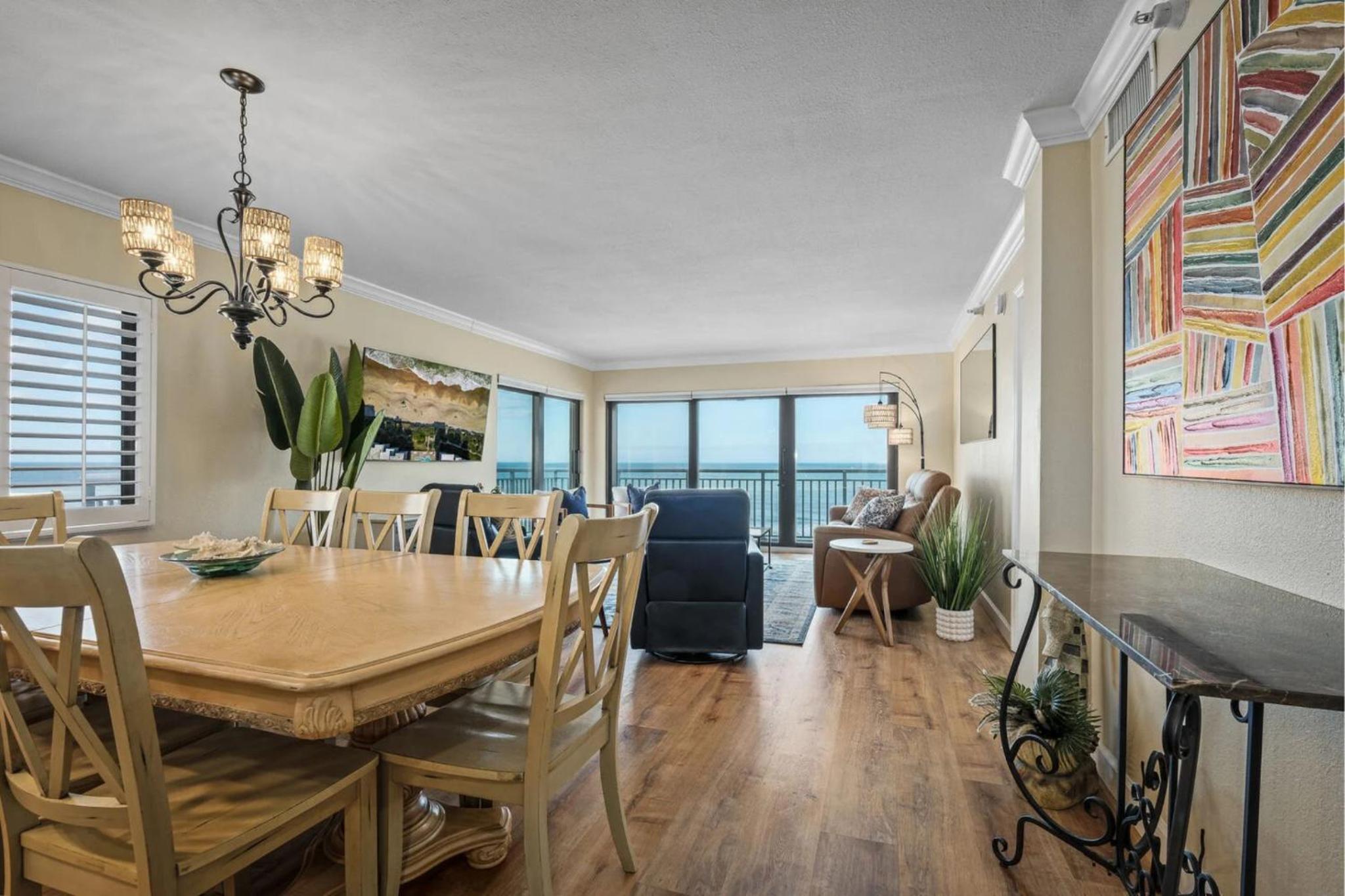 Renovated direct oceanfront corner condo with a huge wrap-around balcony and pool