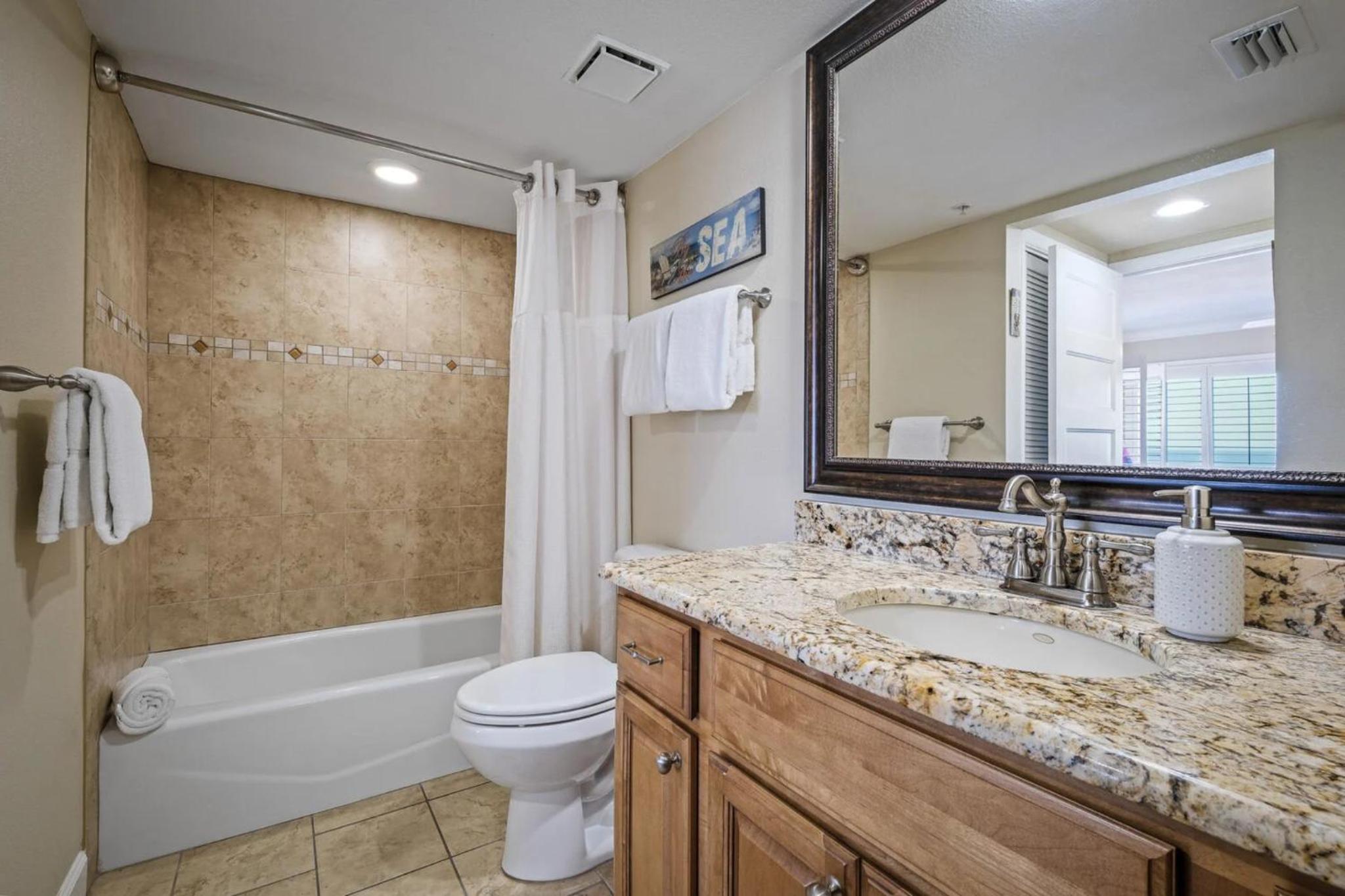 Renovated direct oceanfront corner condo with a huge wrap-around balcony and pool