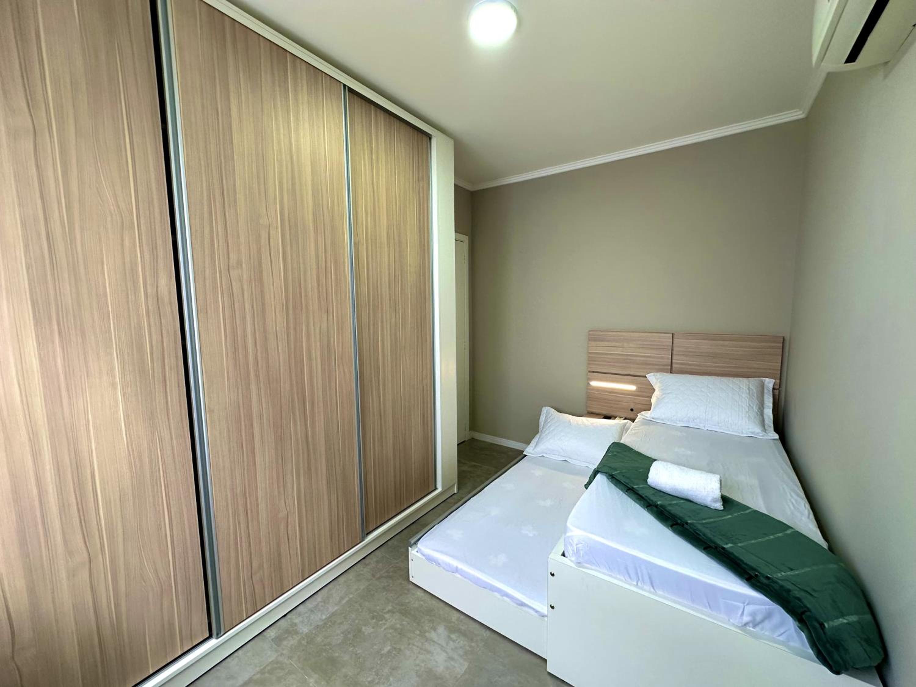 Apartamento Executivo Central WiFi e Garagem