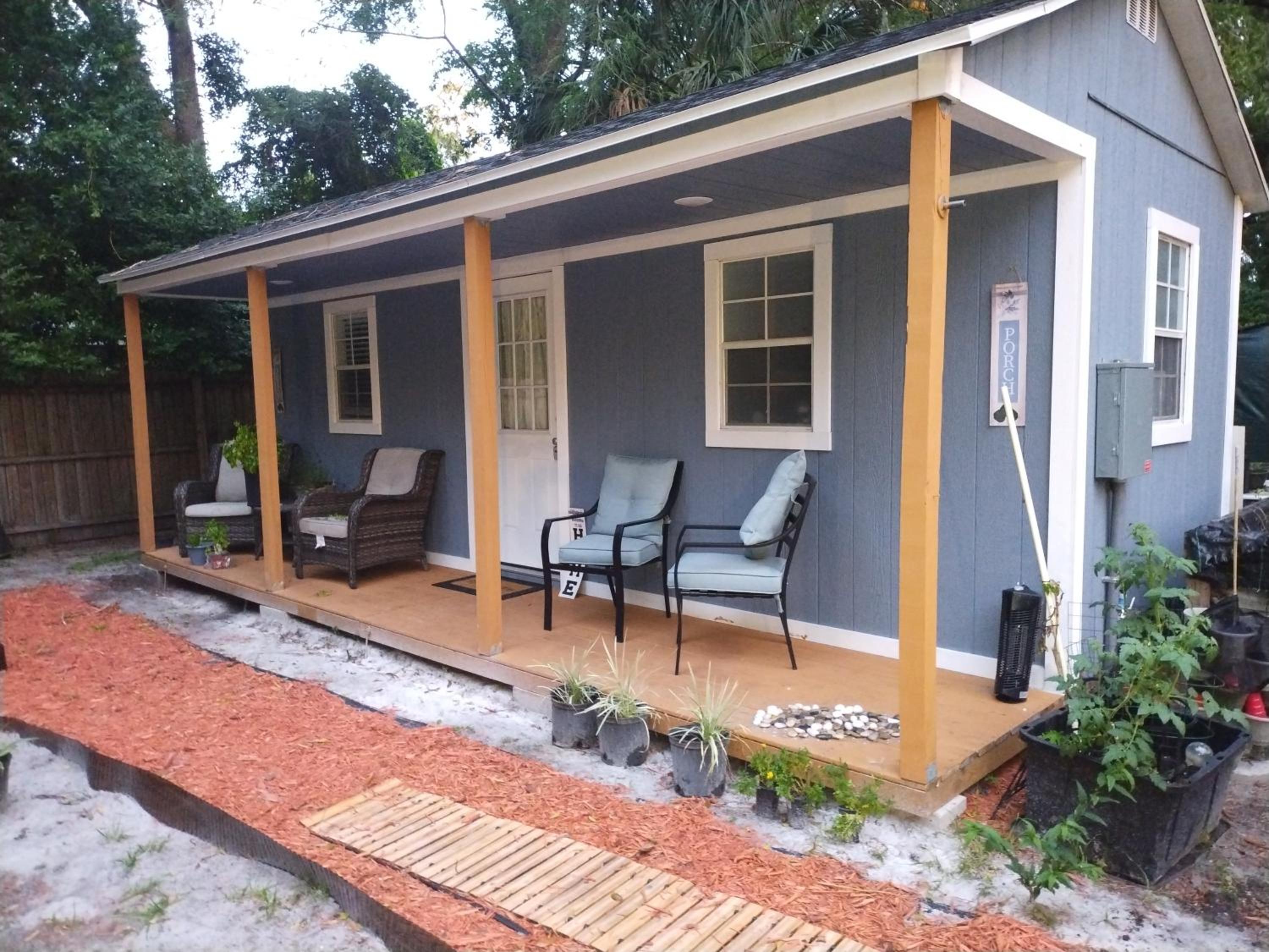 Tiny home barn style in backyard with Animals